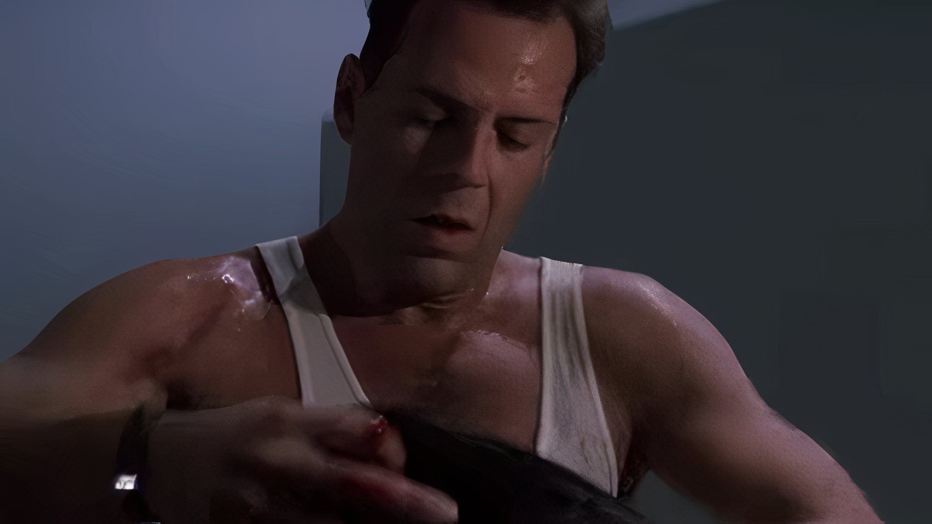 Bruce Willis as John McClane in Die Hard.