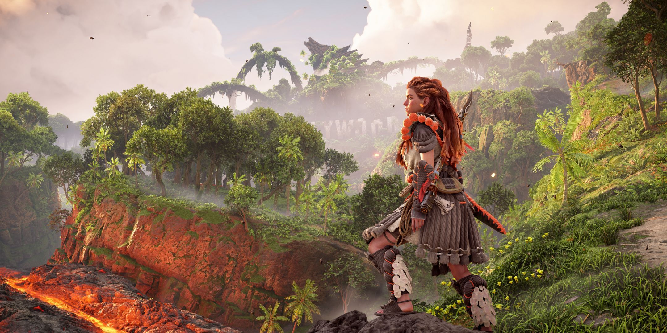 Aloy standing on a cliff in Horizon Forbidden West.