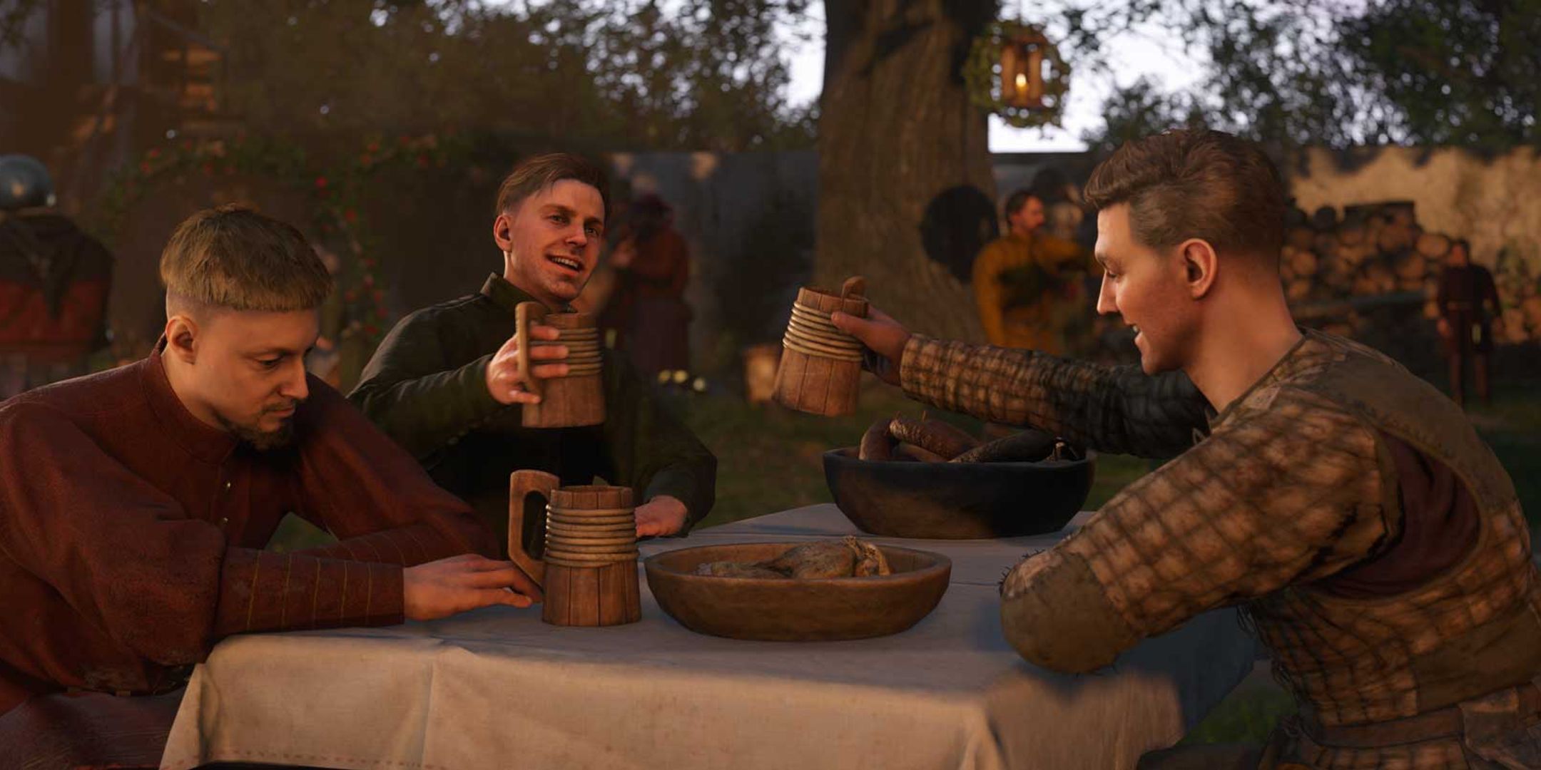 Kingdom Come: Deliverance 2 screenshot of Hans and Henry having a drink at a table.