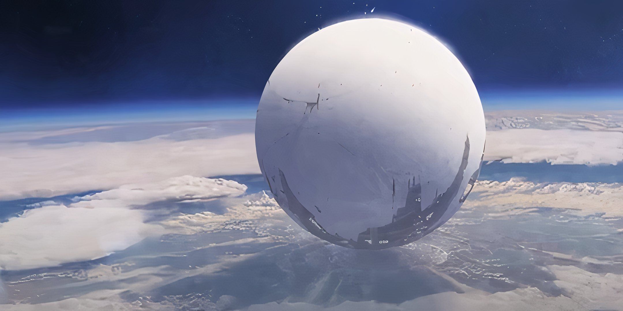 The Traveler floats above the Last City on Earth.