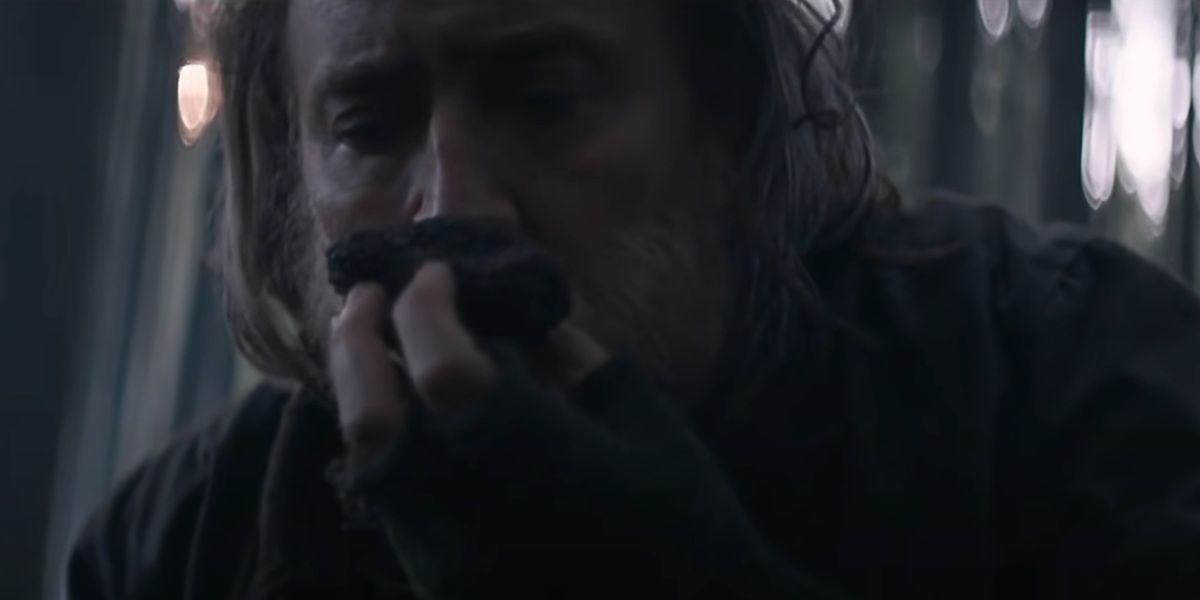 Nicolas Cage smells a chunk of soil in Pig.