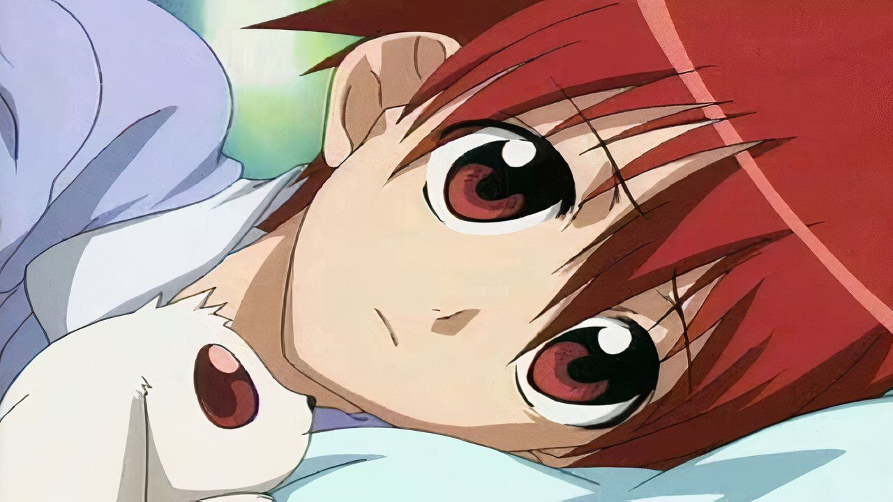 The main character of DNAngel lying in bed next to his pet.