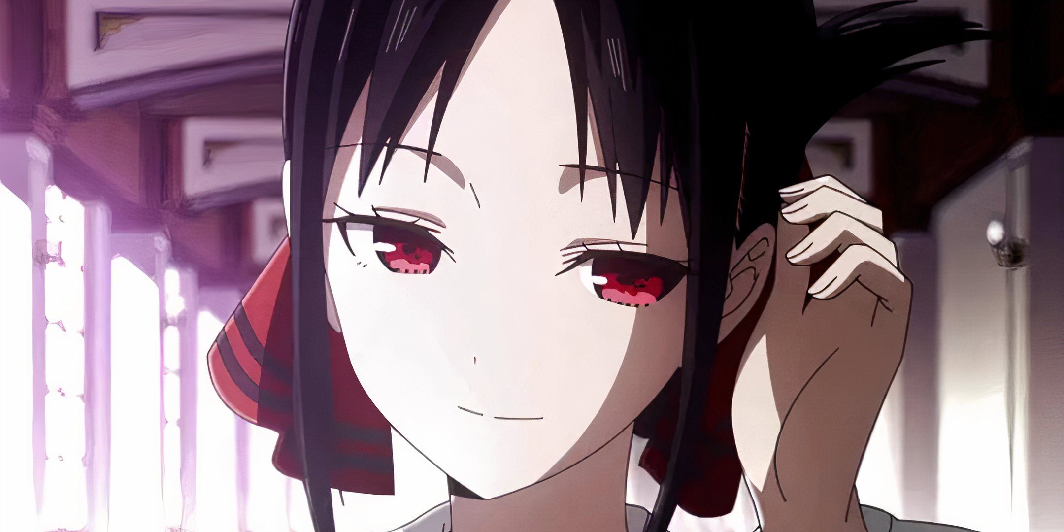 Kaguya from Kaguya-Sama: Love is war that adjusts the hair with a friendly smile.