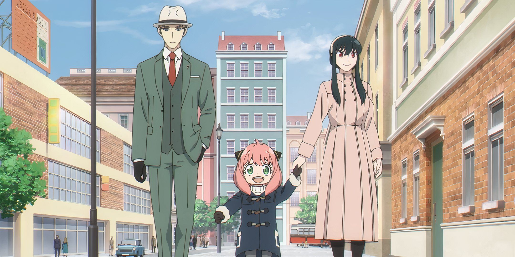 Loid, Anya and Yor from Spy X Family walking down the street.