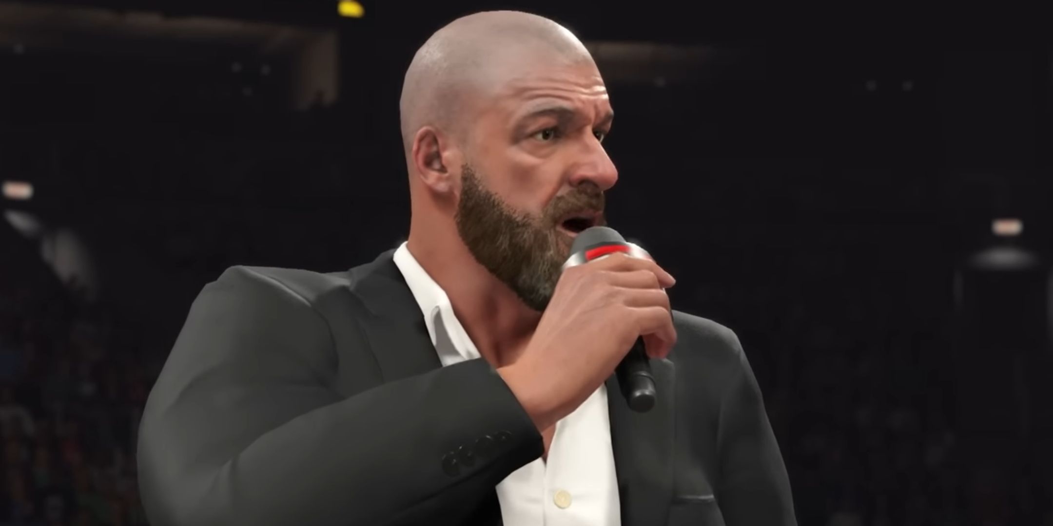 Triple H speaking on a microphone in WWE 2K25.