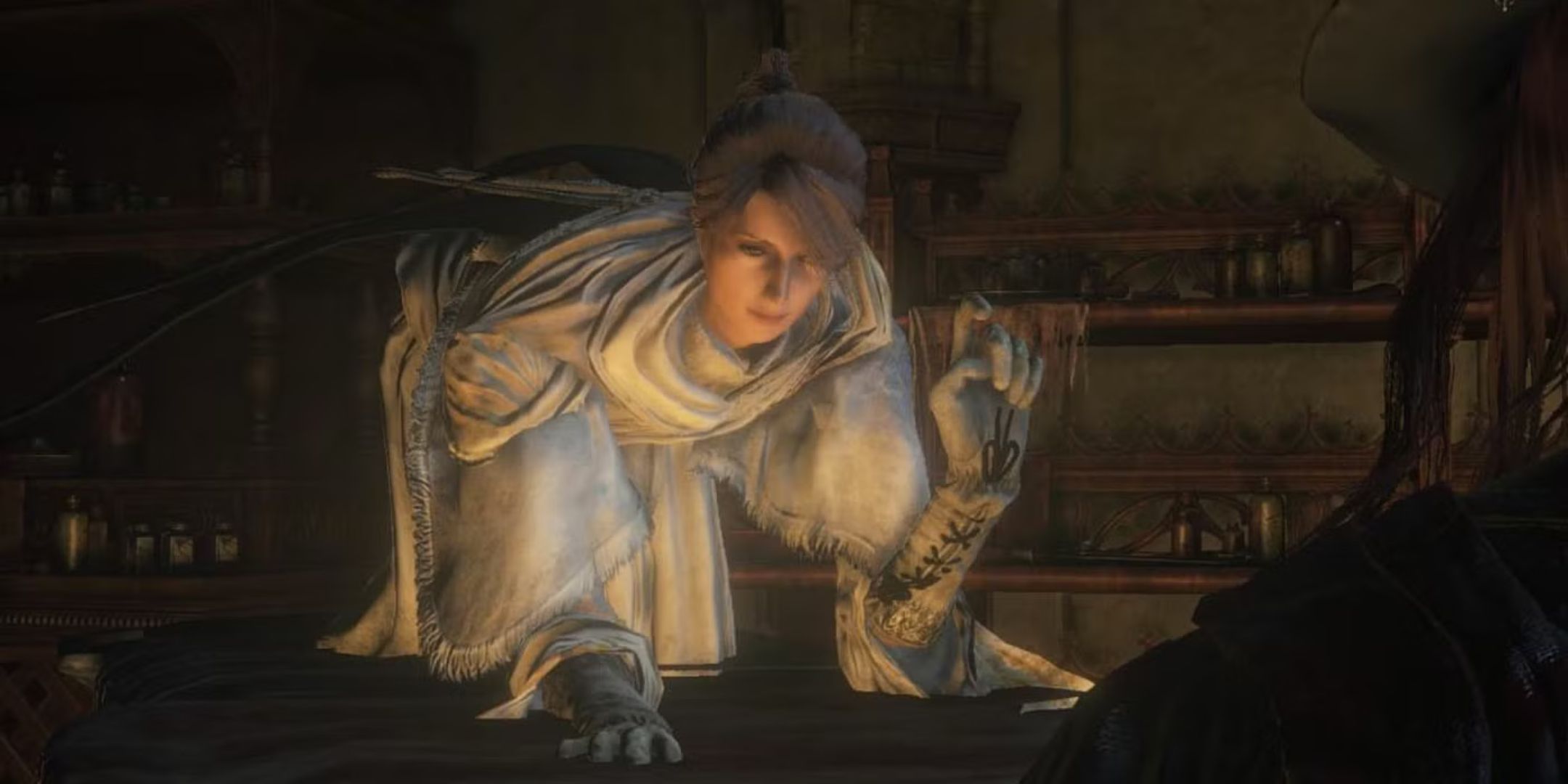 Iosefka on a table in Bloodborne.
