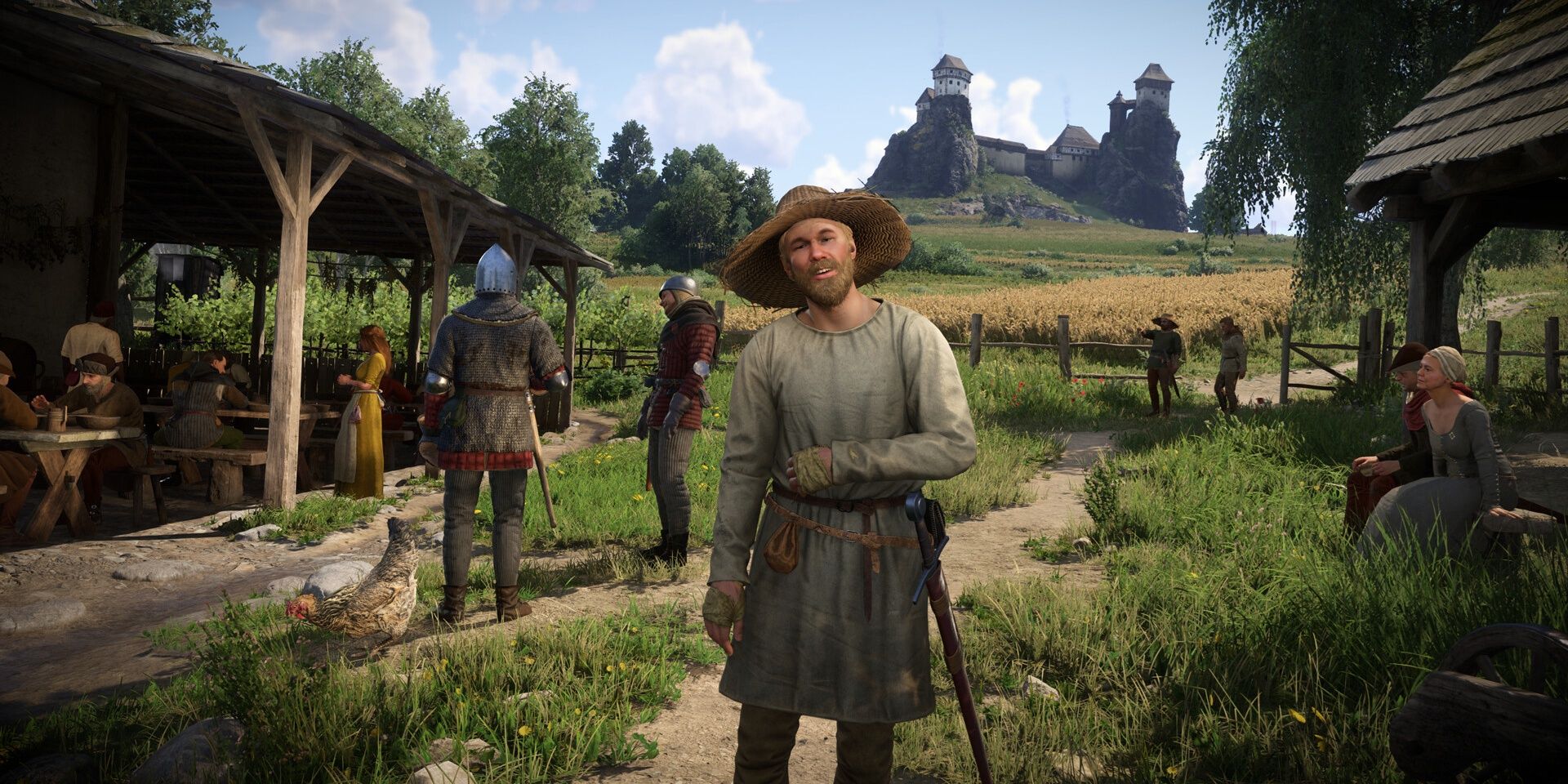 Kingdom Come: Deliverance 2 - A small town outside a castle filled with villagers and soldiers.