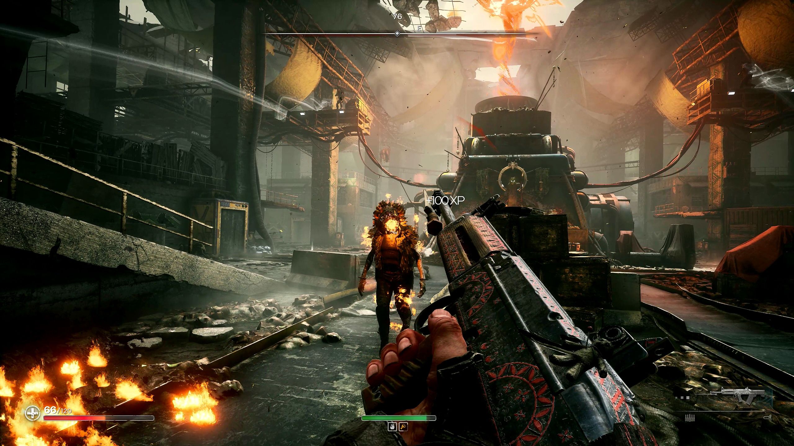 The pioneer player is inspecting his weapon in front of the enemy.
