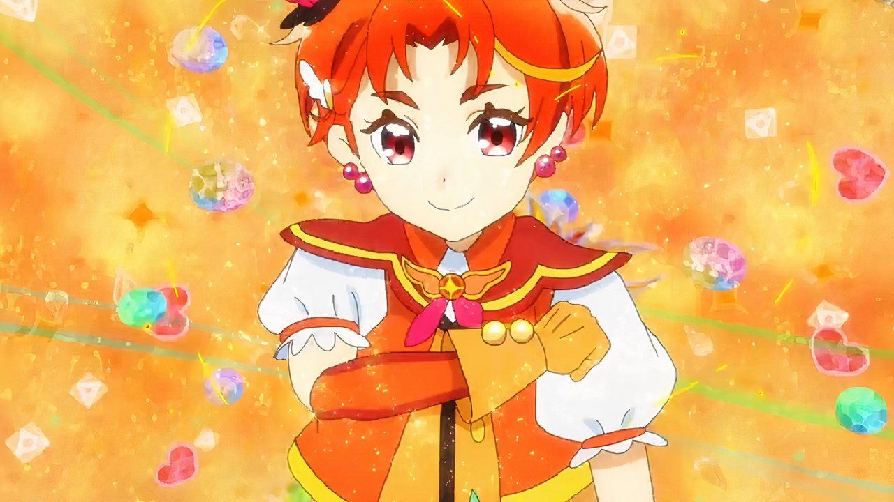 Tsubasa smiles kindly in front of an orange background in Soaring Sky Pretty Cure.