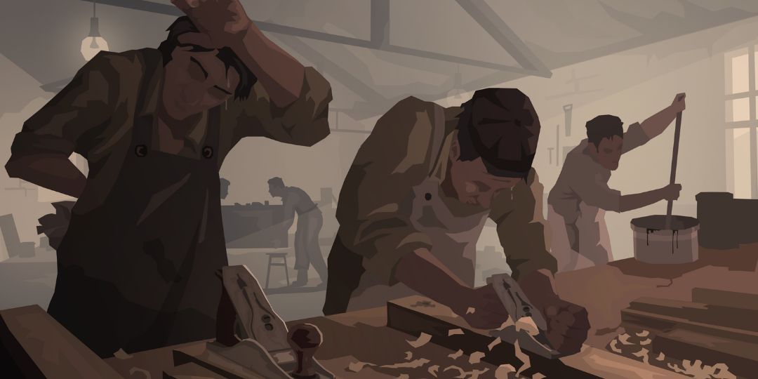 Two men work hard in a sweat shop.