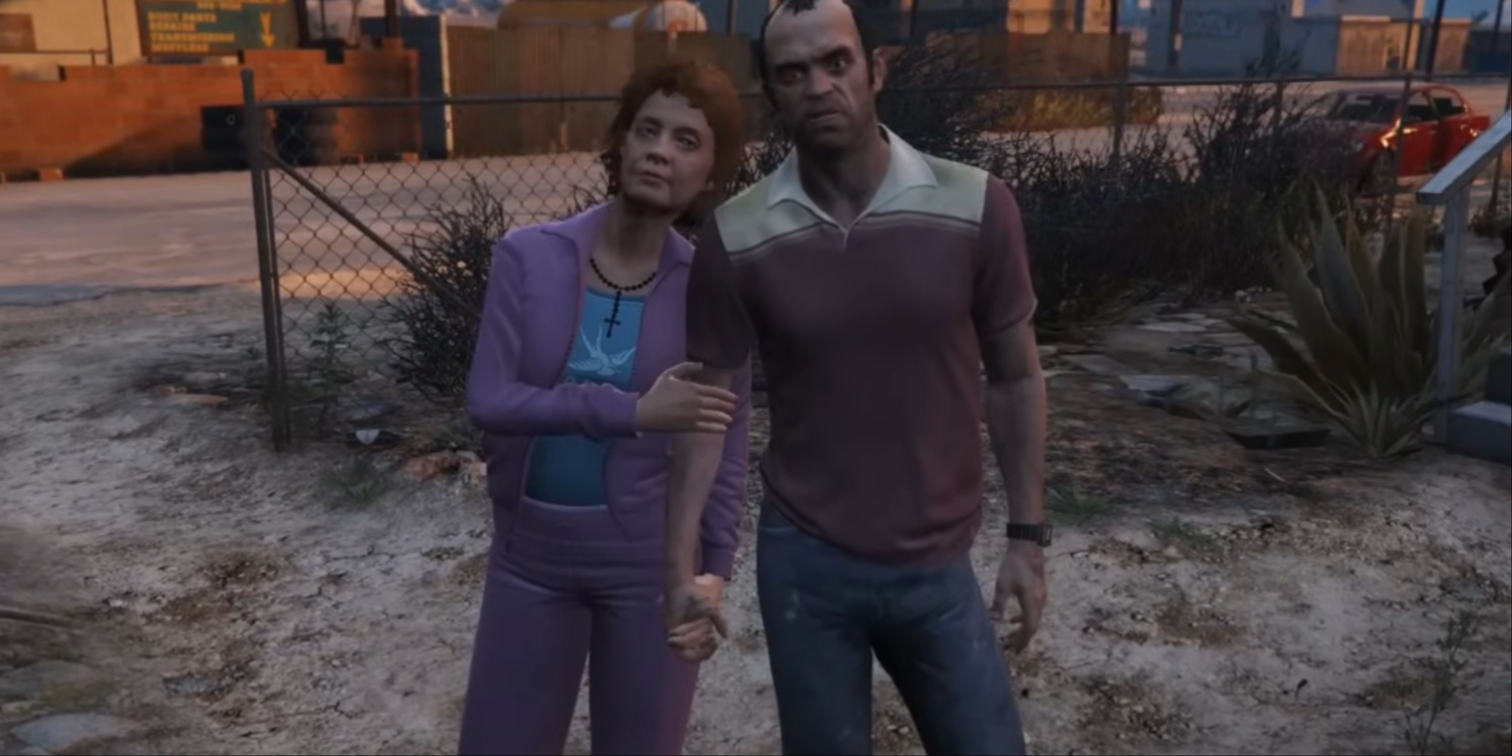 Patricia holding Trevor's hand and leaning on his shoulder in GTA 5.