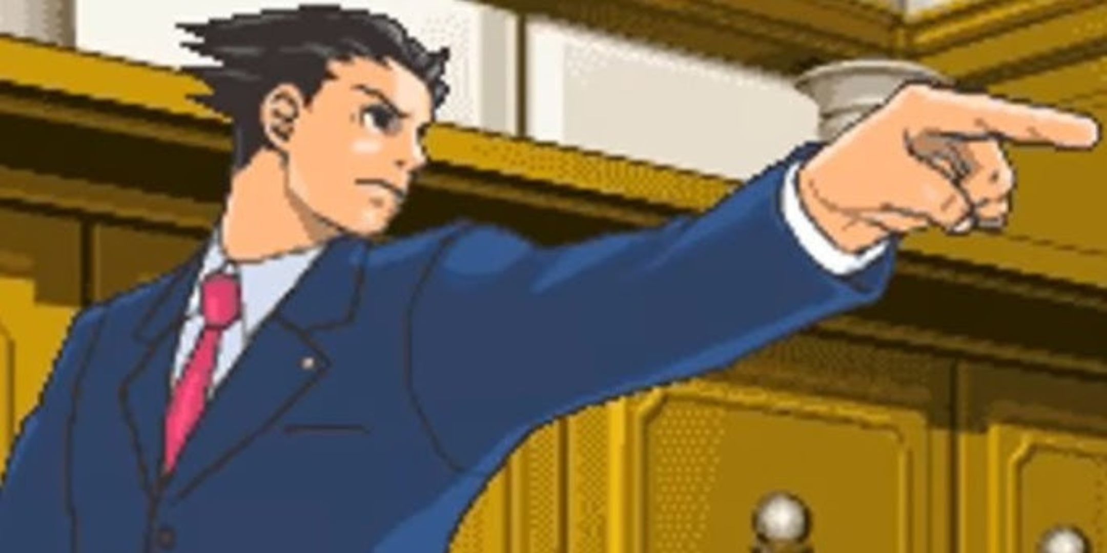 Phoenix Wright pointing to the right in the DS version of Phoenix Wright Ace Attorney.