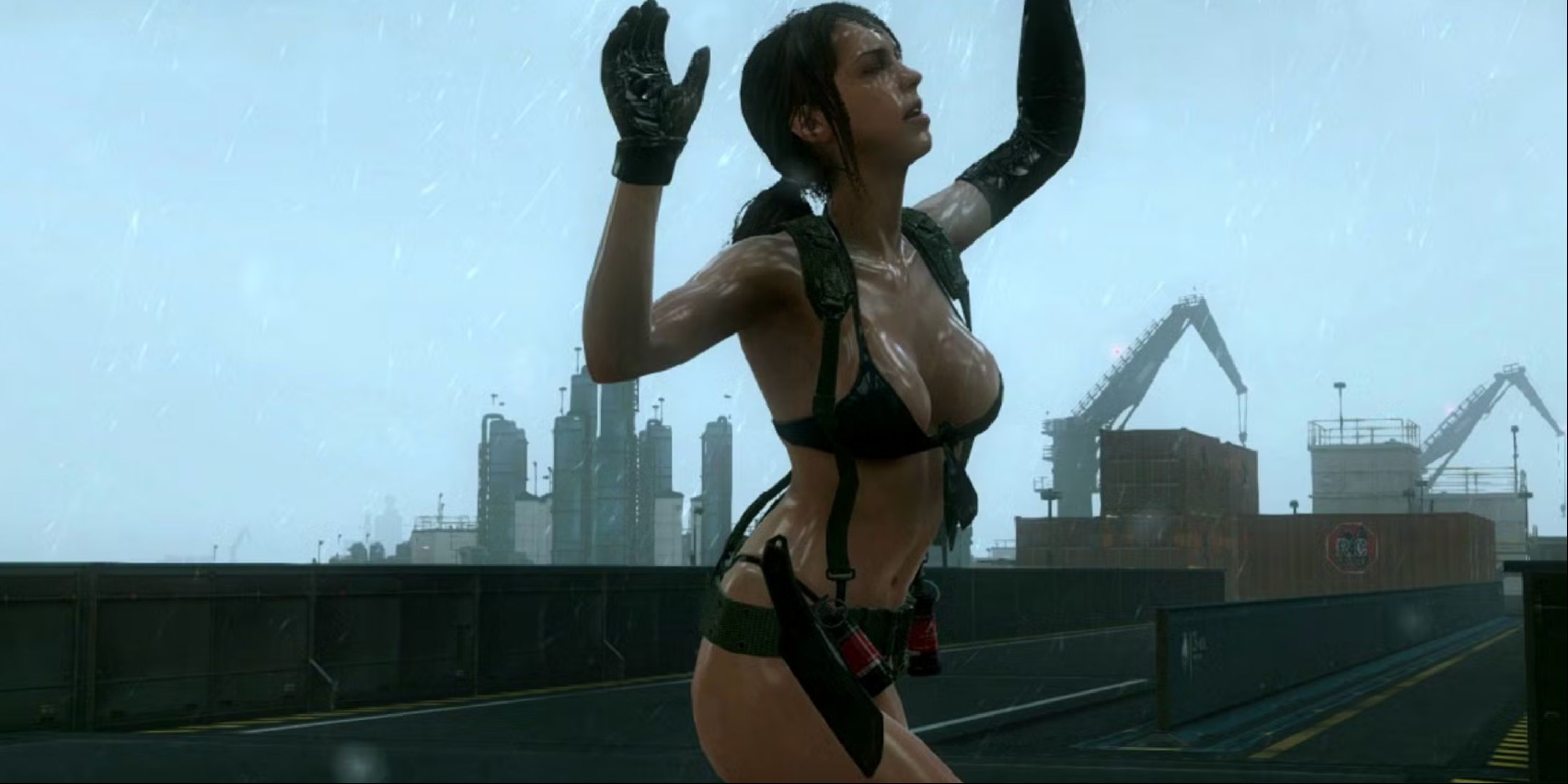 Quiet with barely any clothing dancing in the rain with her arms raised in MGS5 The Phantom Pain.