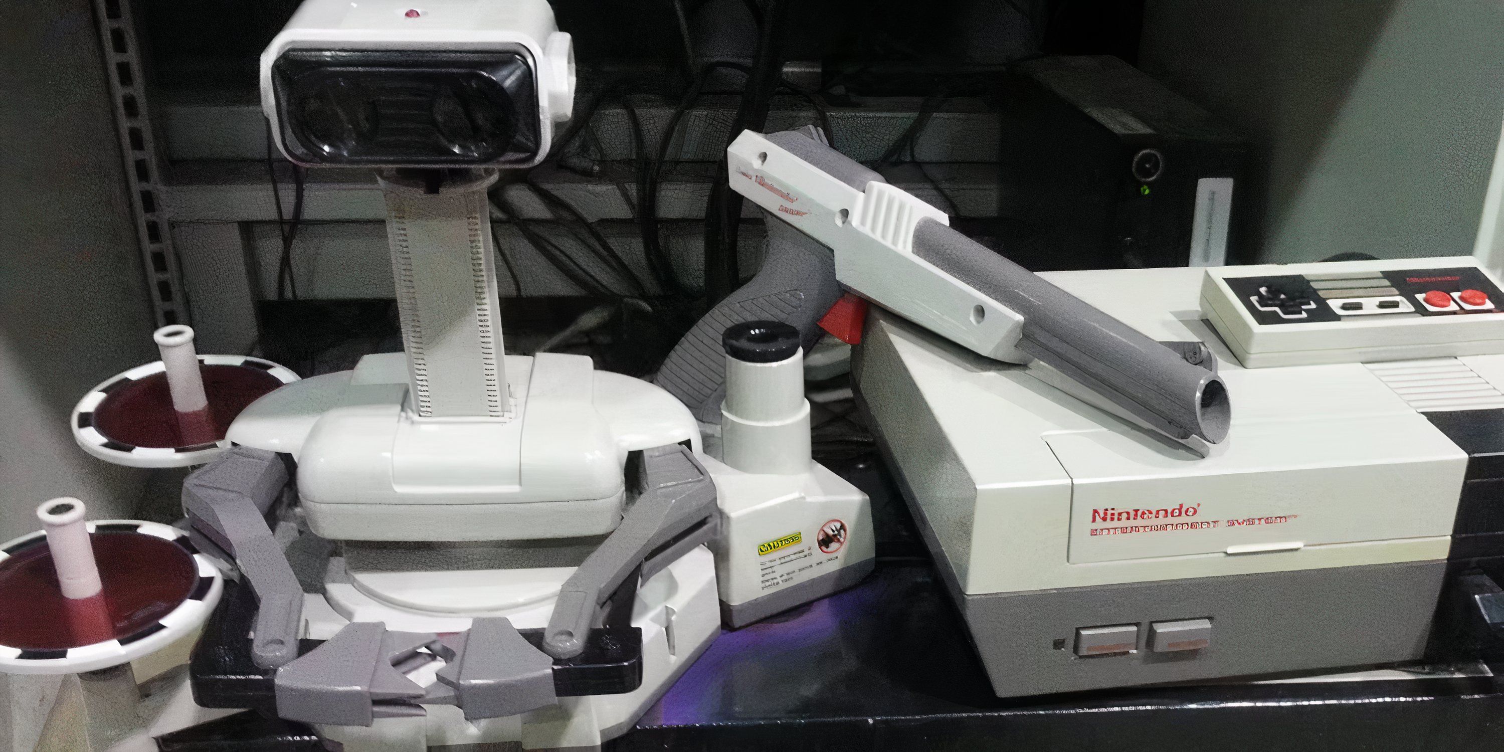 ROB the Robot beside an NES console.