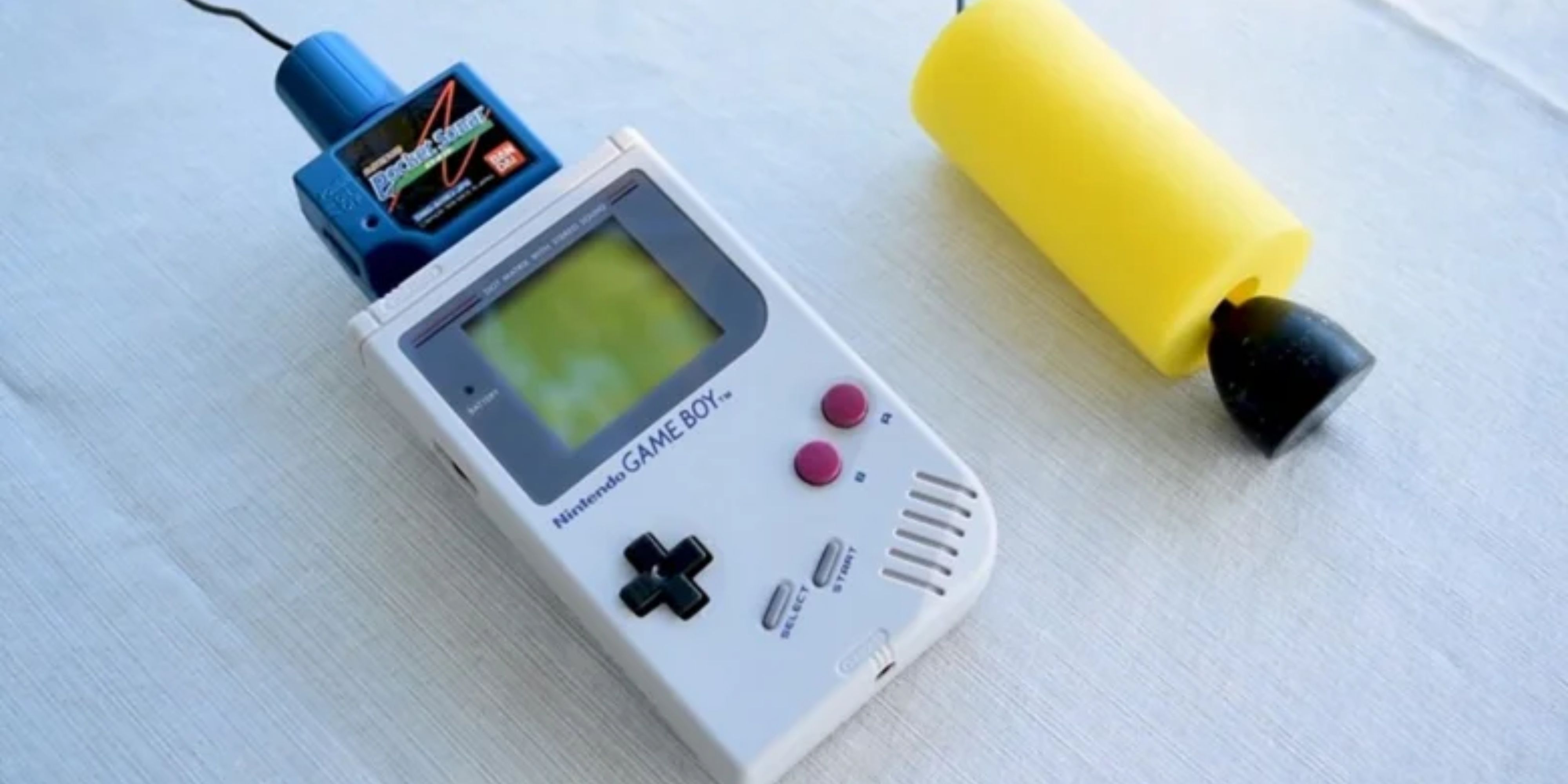 The Game Boy Pocket Sonar is connected to the Game Boy.