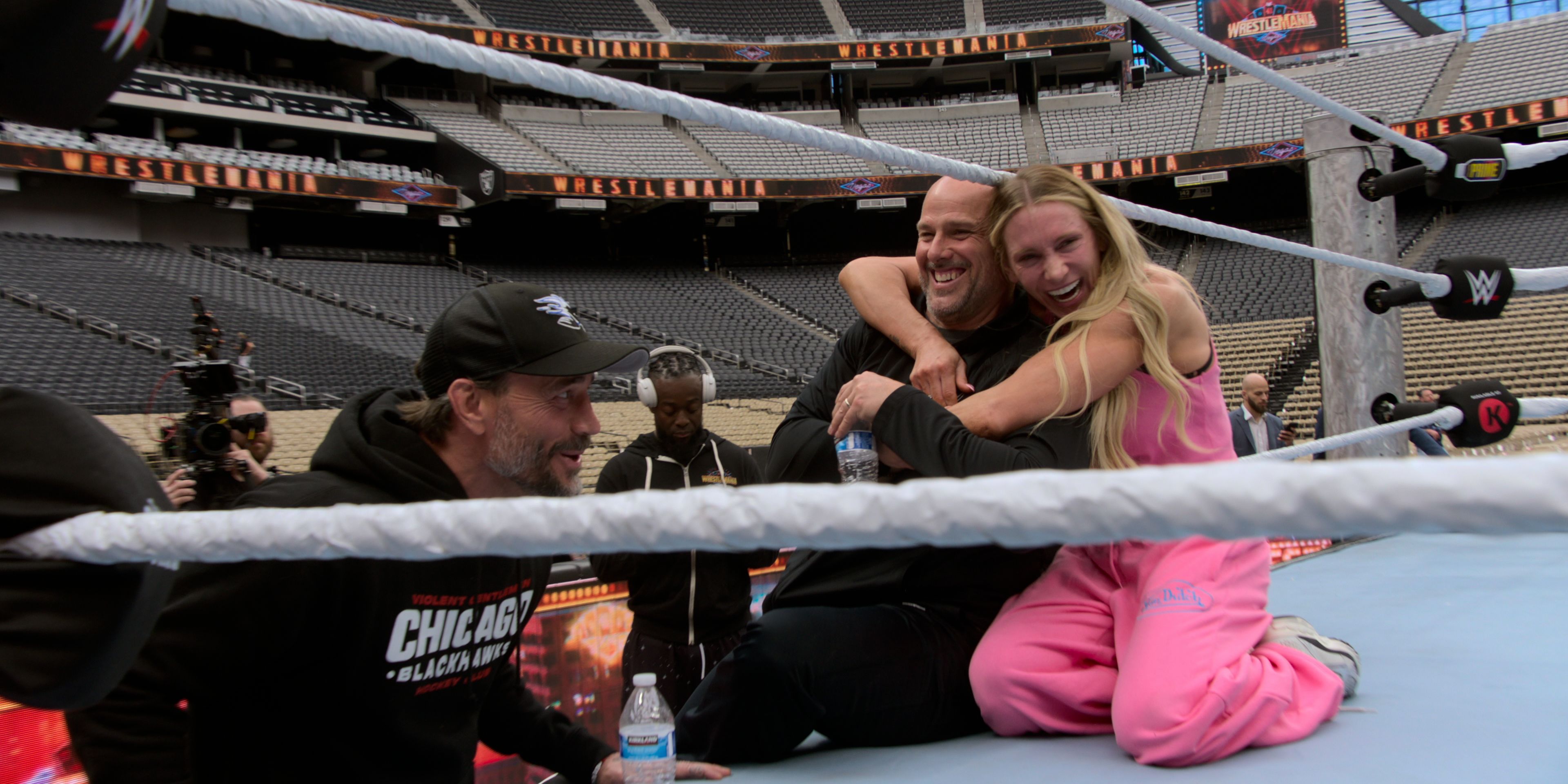 CM Punk, Adam Pearce and Charlotte Flair in WWE Unreal