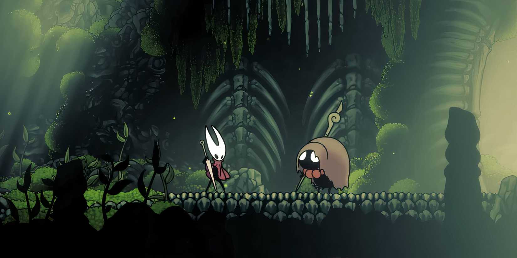 Hornet standing next to a small creature with a hood in hollow knight Silksong.