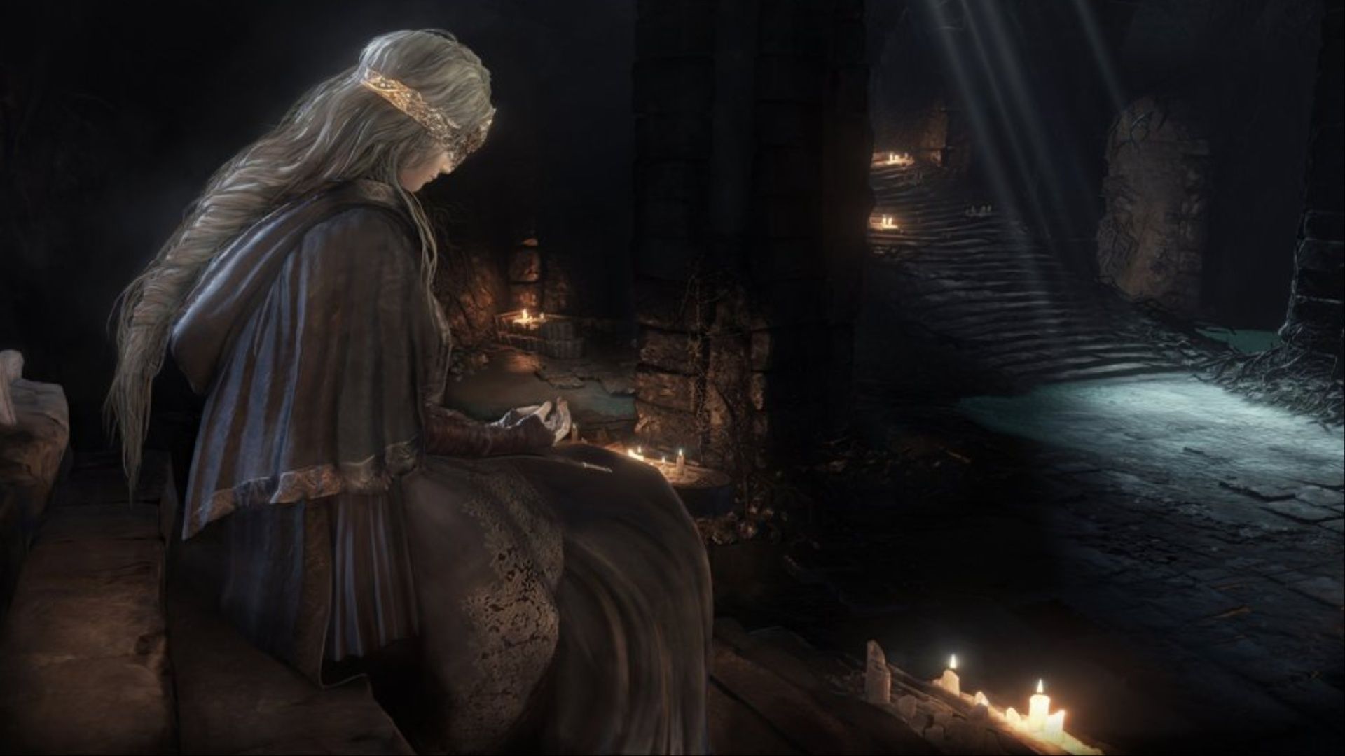 The firefighter sits on the stairs inside the fireline shrine in Dark Souls 3.