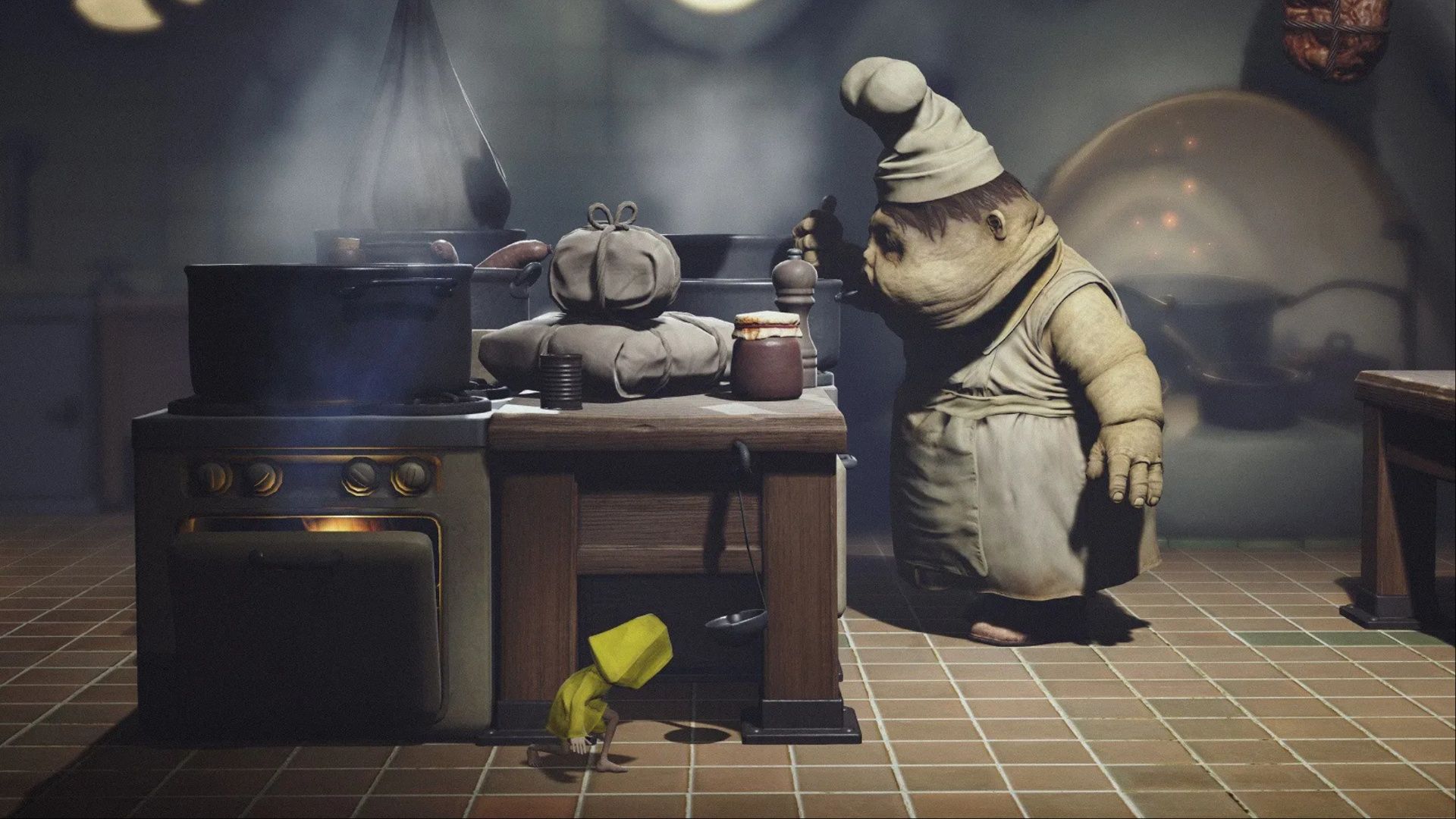 Six sneaking past a chef in the kitchen in Little Nightmares.