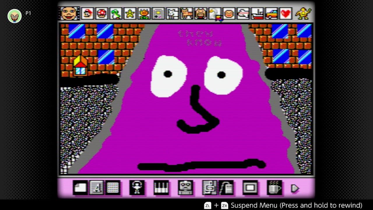 A creation done on Mario Paint. It's a great purple triangle with a related face.