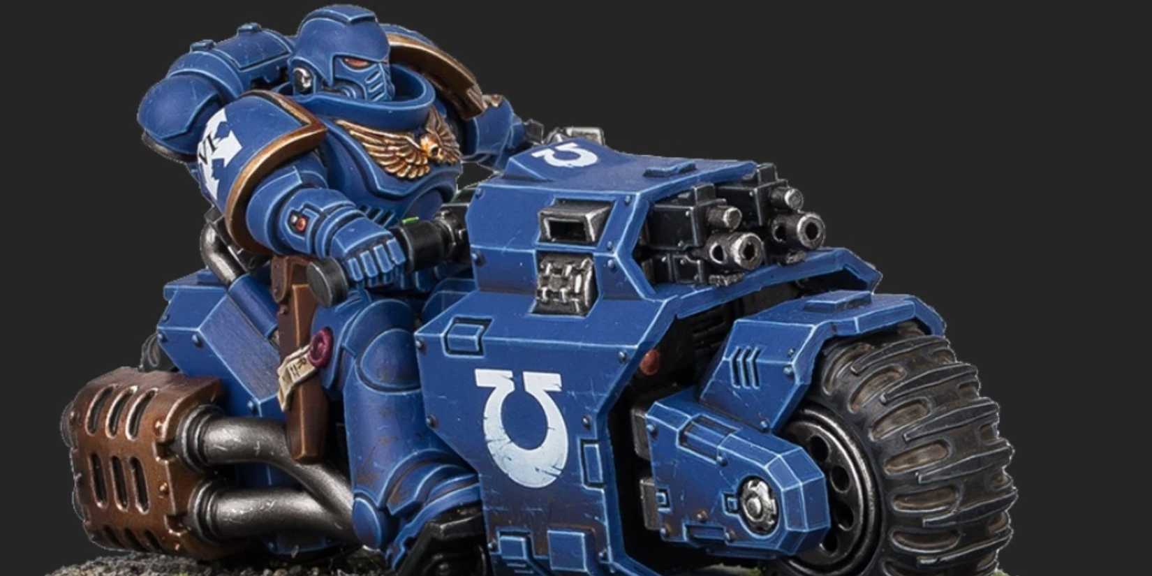 a Raider Combat Bike for Warhammer 40k, painted in Ultramarines colors.
