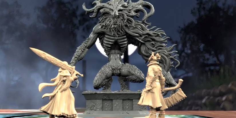Two heroes fighting a monster from the Bloodborne board game.