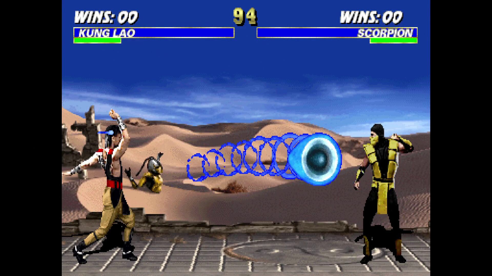 Kung Lao throwing his hat against Scorpion in Mortal Kombat: Legacy Kollection.