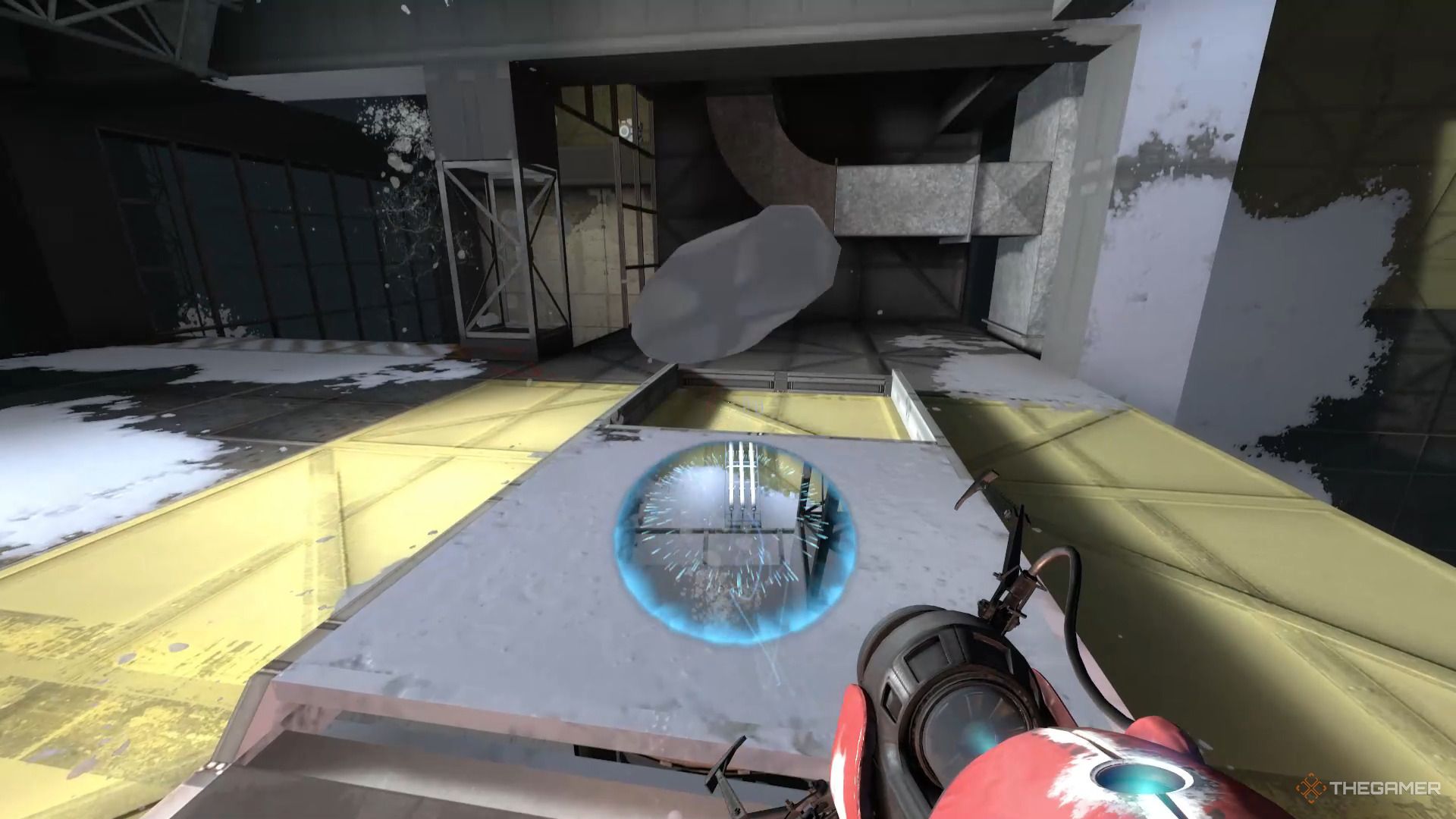 A screenshot from Portal revolution of the player character with a red portal gun looking into a blue portal that has white paint falling through it.