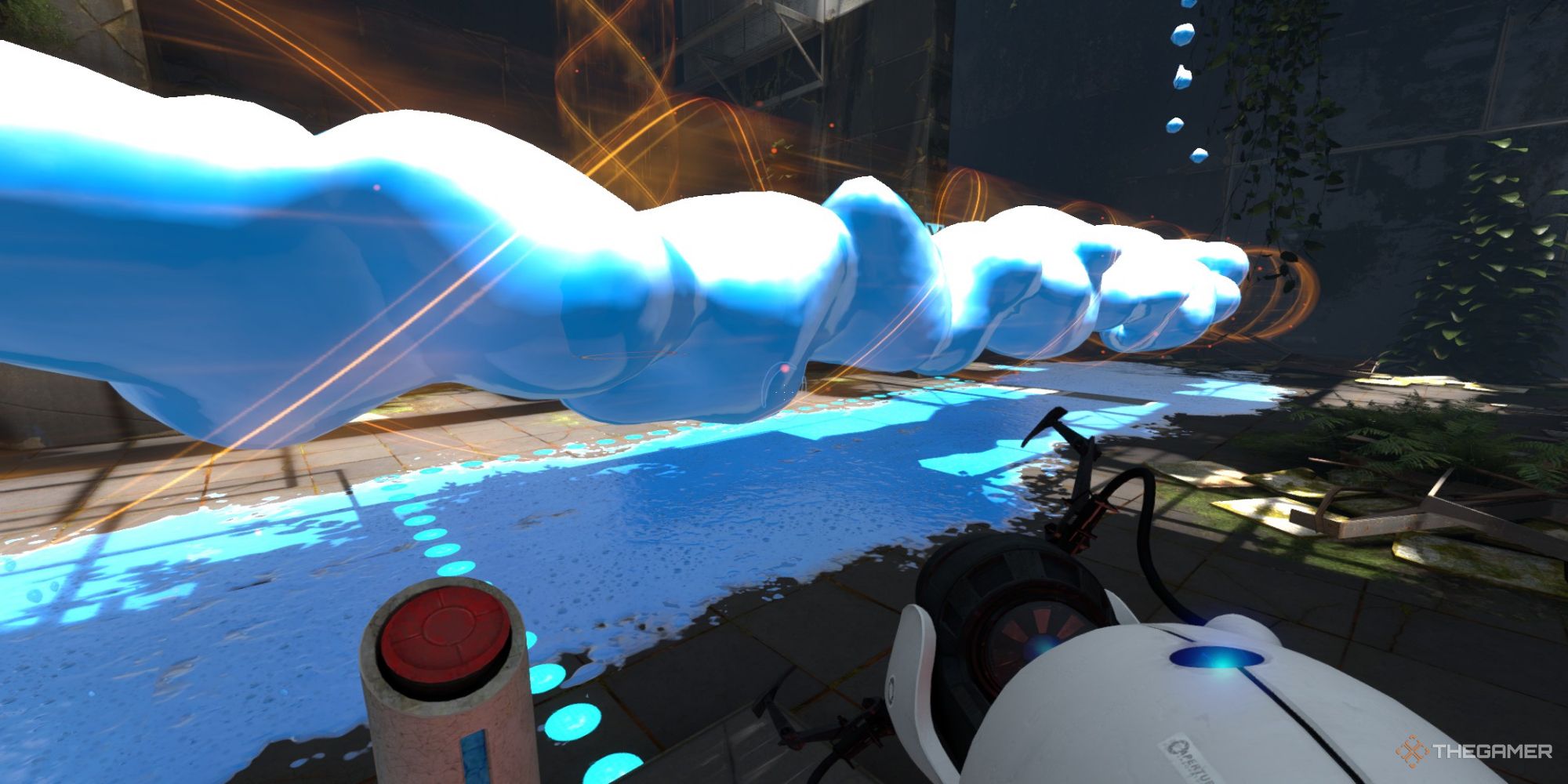 A screenshot from Portal Revolution shows the player character moving blue goo with a tractor beam