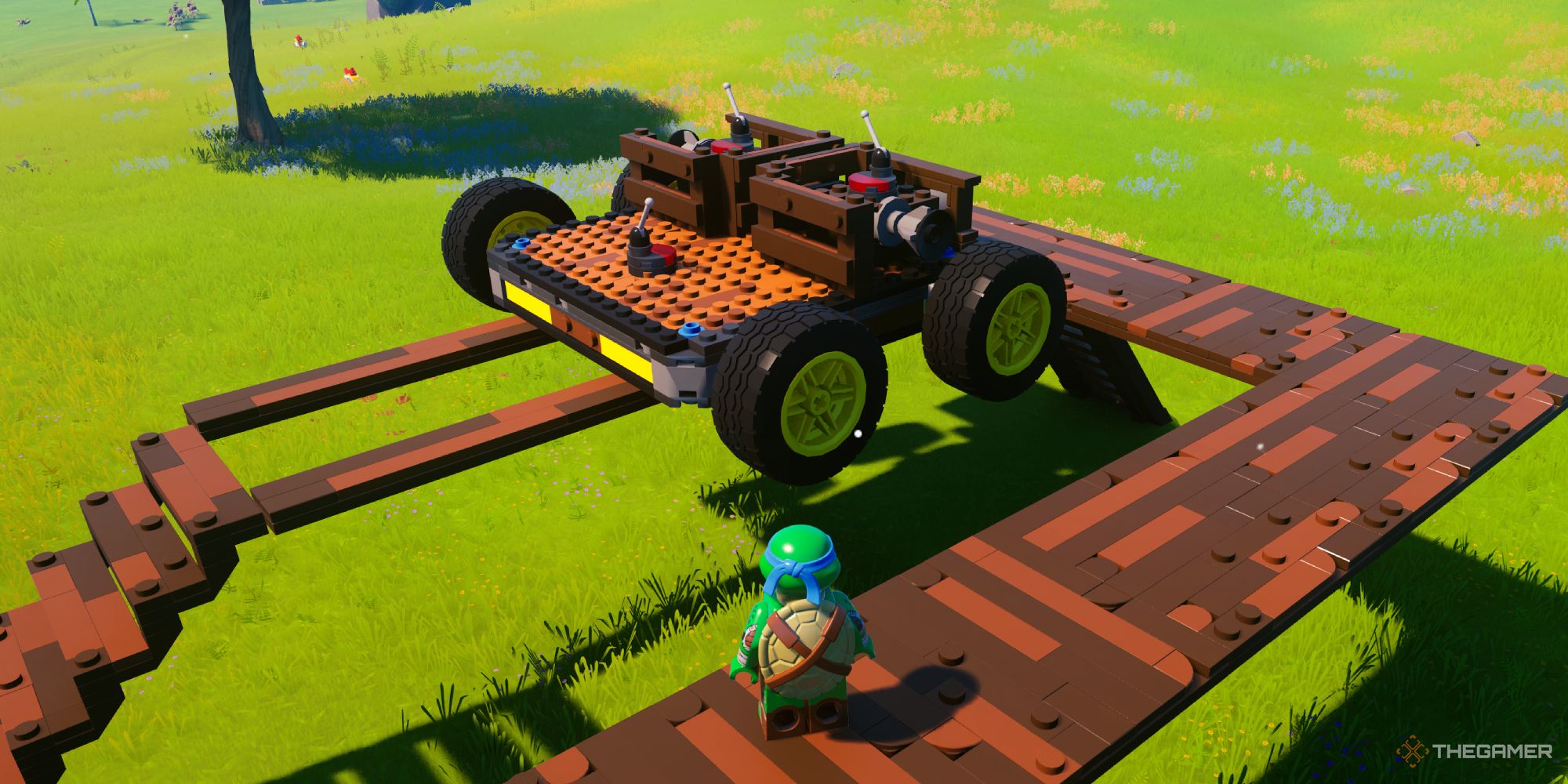 Building a car in Sandbox mode using wheels and thrusters and switches, which is part of one of the Freeplay quests in Lego Fortnite