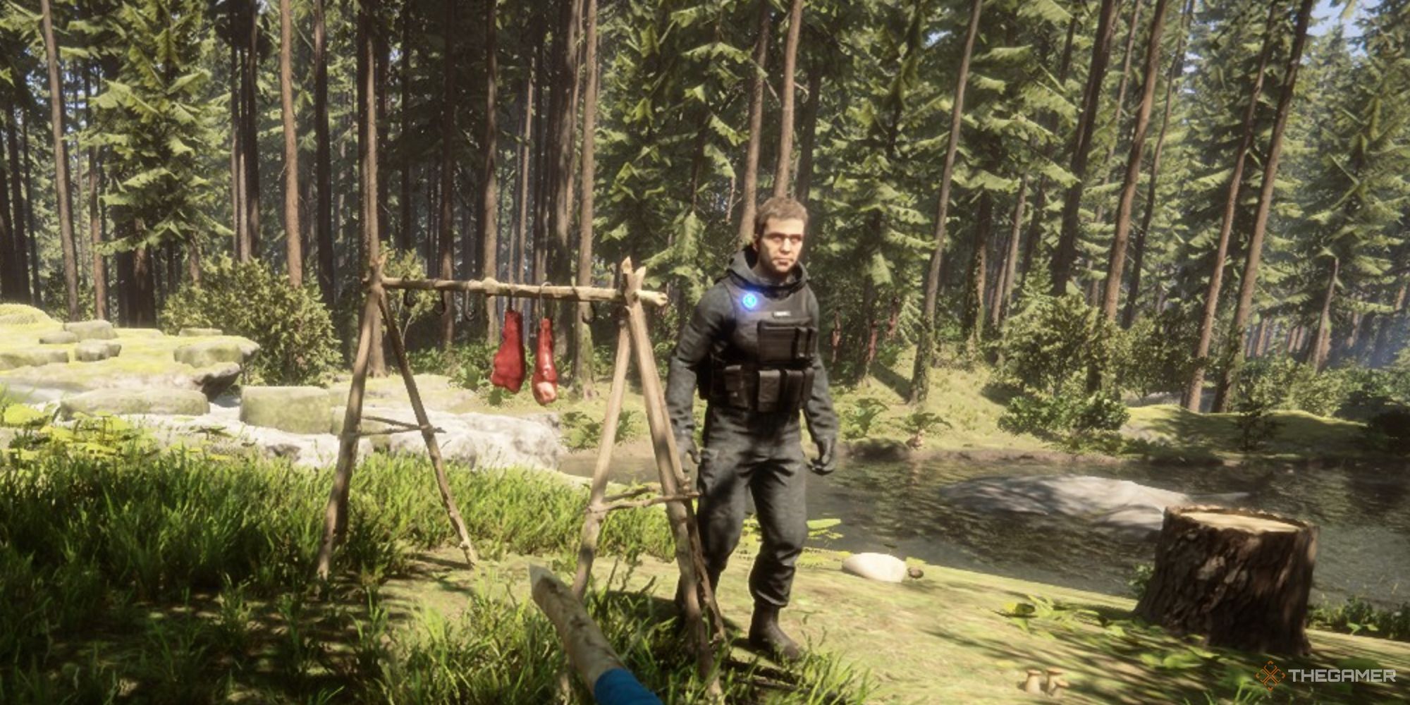 A screenshot from Sons of the Forest showing Kelvin standing next to a drying rack with two pieces of meat on it.