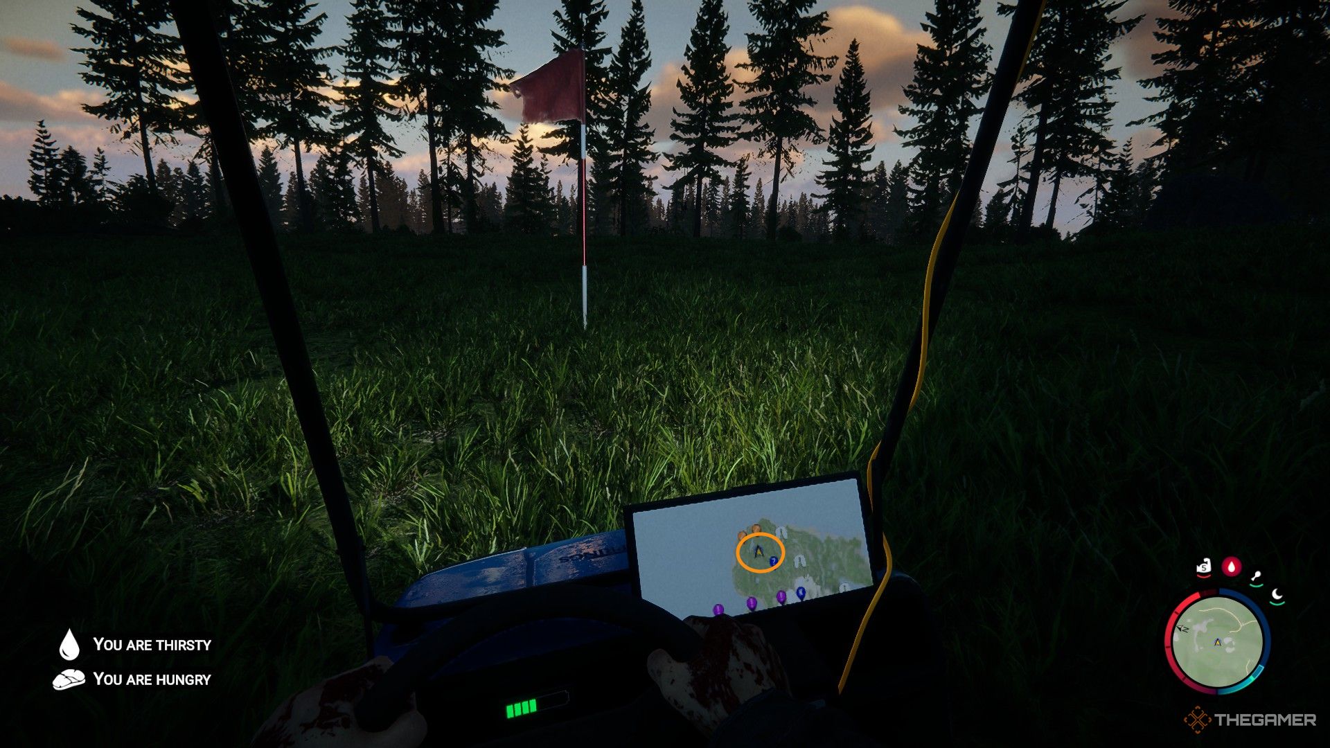 A screenshot from Sons of the Forest showing the player character sitting in a golf cart with its headlights aimed at a red and white golf flag. A map can be seen on a lower screen on the cart, with an orange circle highlighting the general area of the golf course.