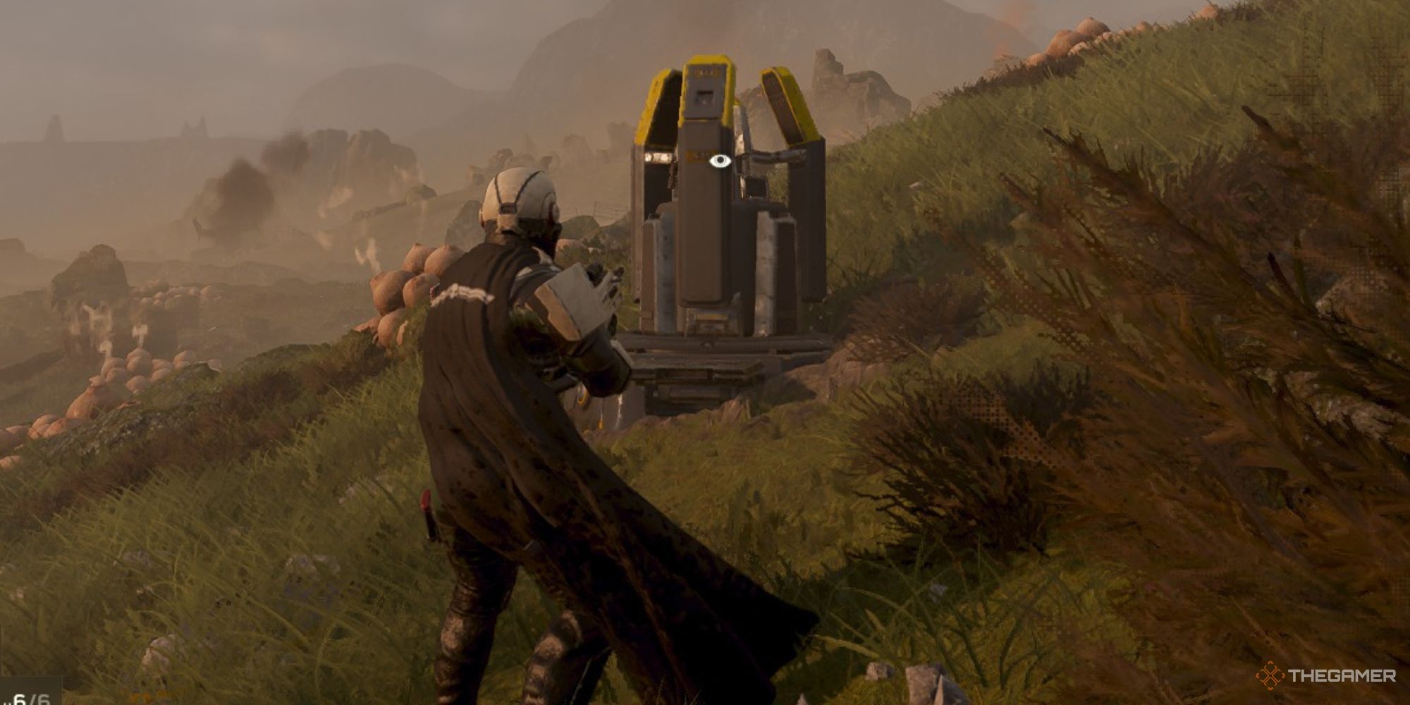 Helldiver in a grass field looking at a SOS Beacon in Helldivers 2. 