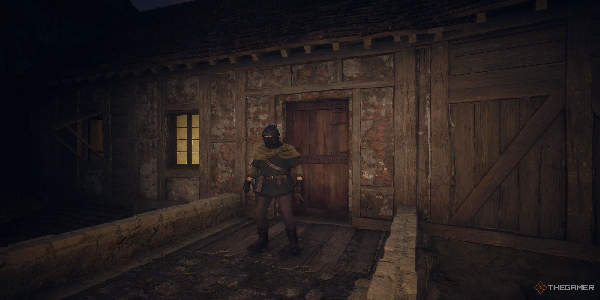 A screenshot from Dragon's Dogma 2 showing the player character thief standing outside of Mildred's Dwelling.