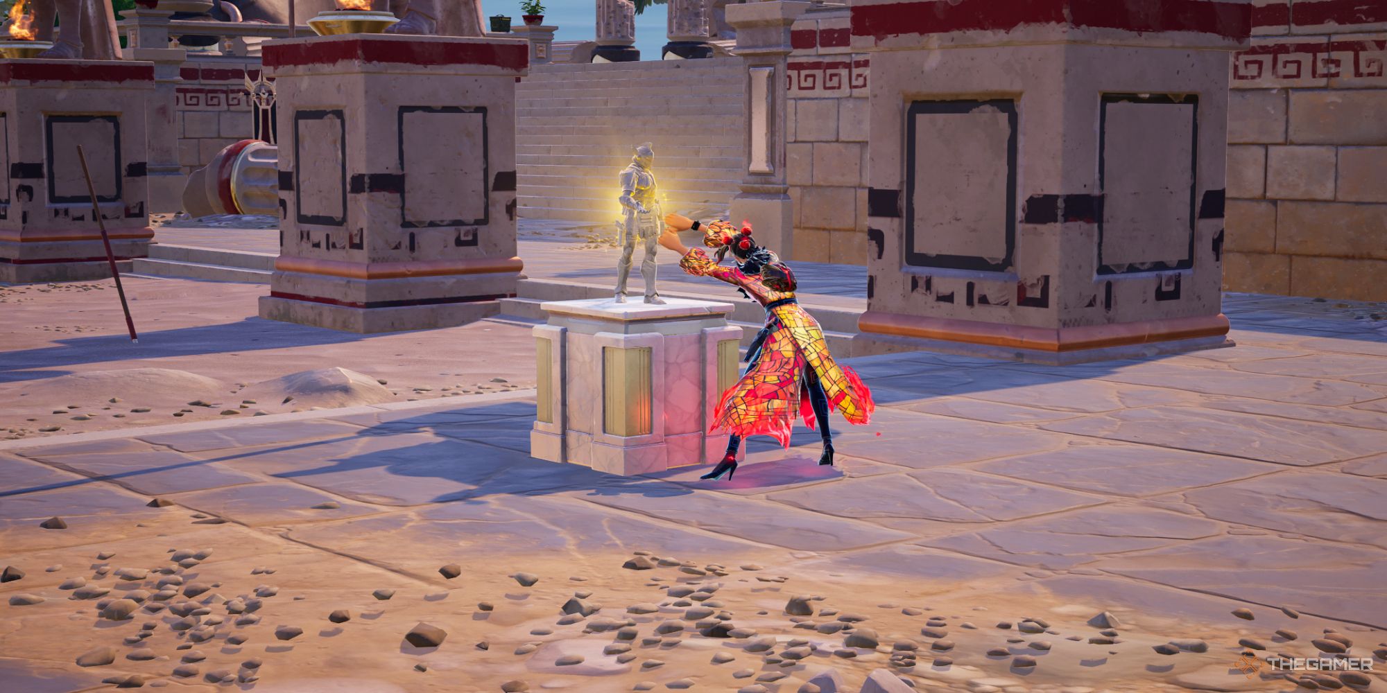 A screenshot from Fortnite showing the player character as Valeria at Brawler's Battleground grabbing the Ares statue at the altar to throw it to the side.