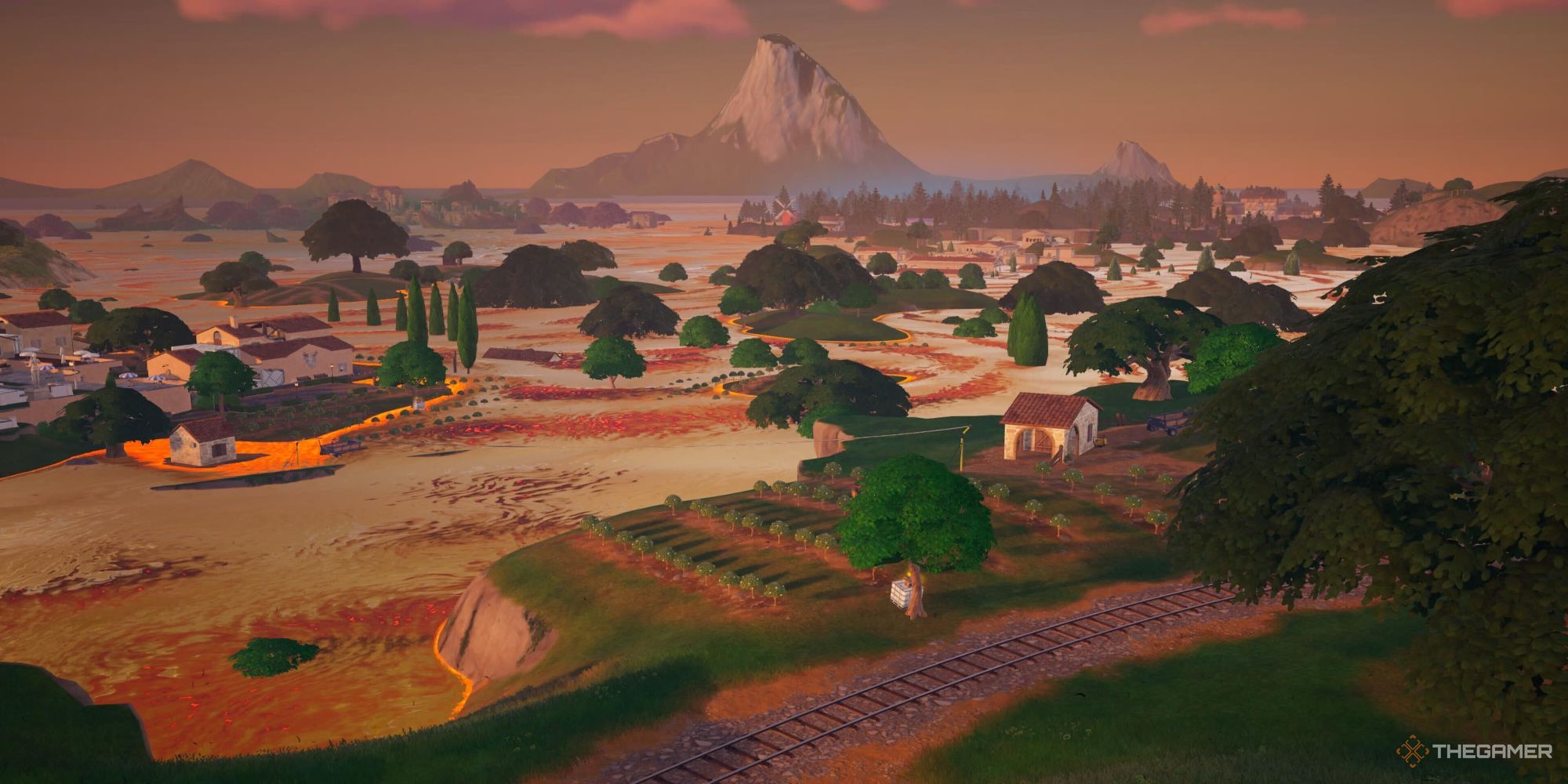 A screenshot from Fortnite Chapter Five Season Two's Limited Time Floor is Lava event where molten goldcan be seen rising across the island's landscape, with many trees sticking out of the liquid.