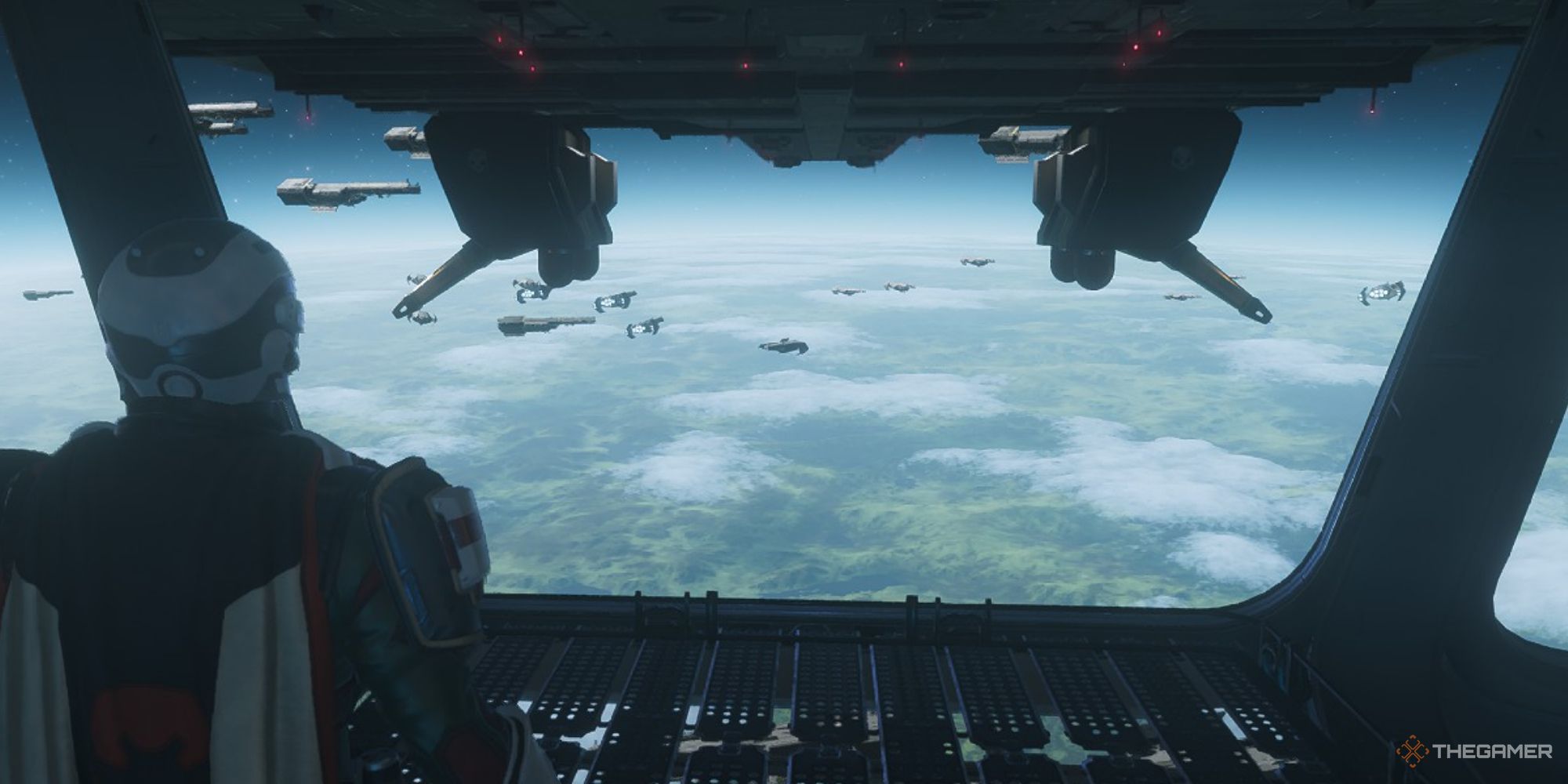A screenshot from Helldivers 2 showing the player character standing on the deck of their ship, staring out at the cannons of their ship aiming down at a cloudy green planet below.