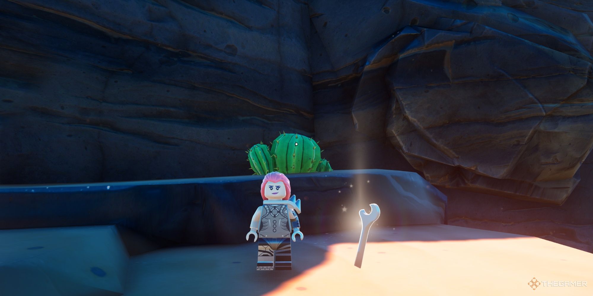 An image from Lego Fortnite of the playable character standing next to the Wrench.
