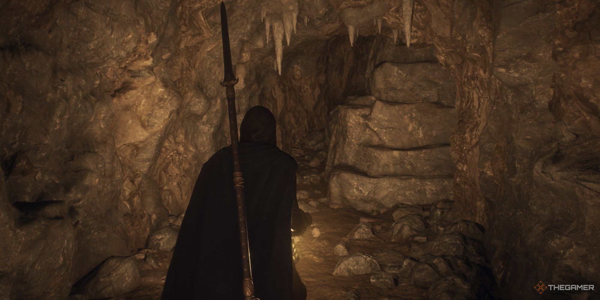 Mystic Spearhand Arisen walking through a cave illuminated by their lantern