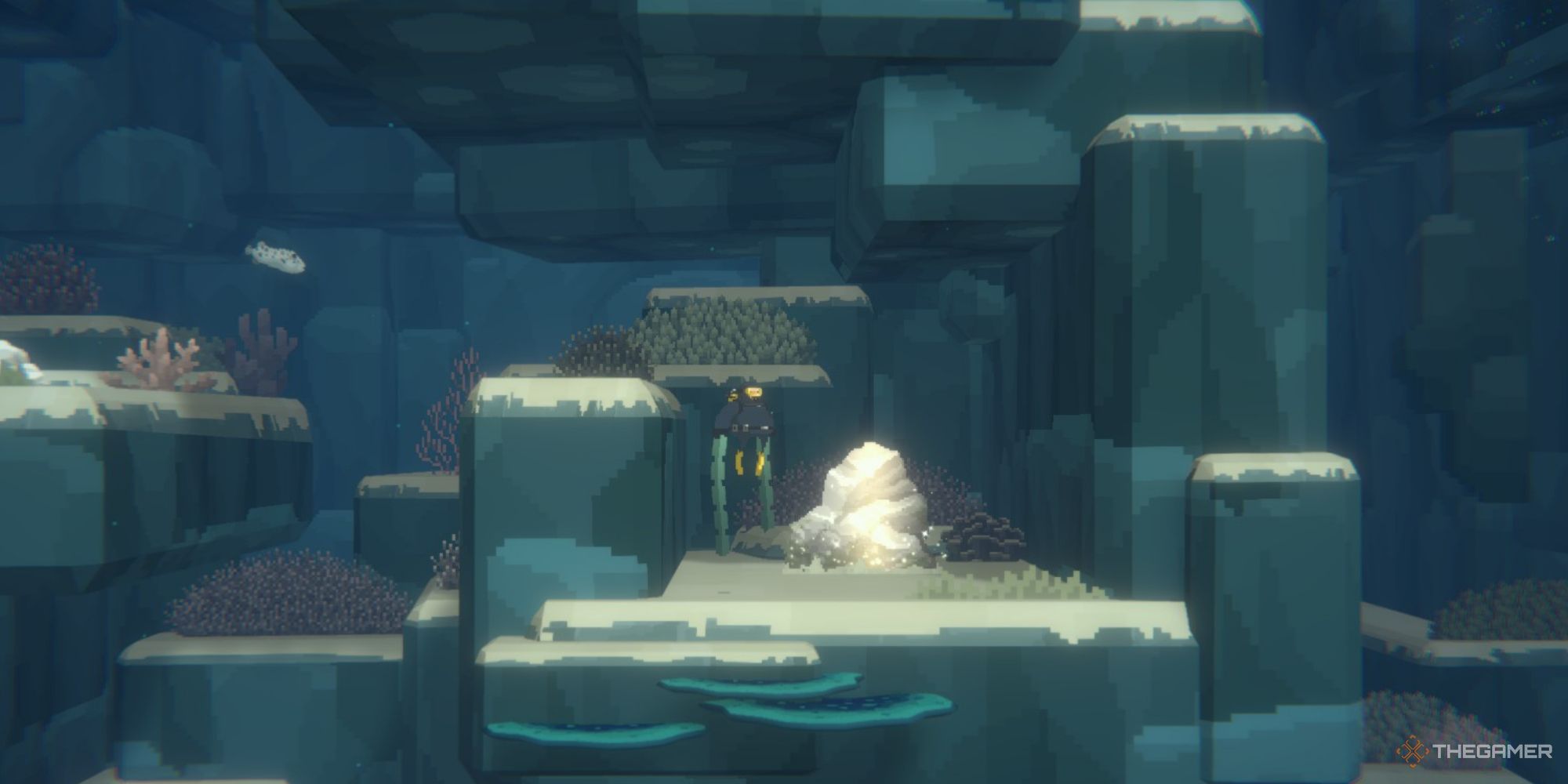 A screenshot from Dave the Diver showing Dave in the early depths floating next to a shiny rock that is a light silver color with a sheen across it.