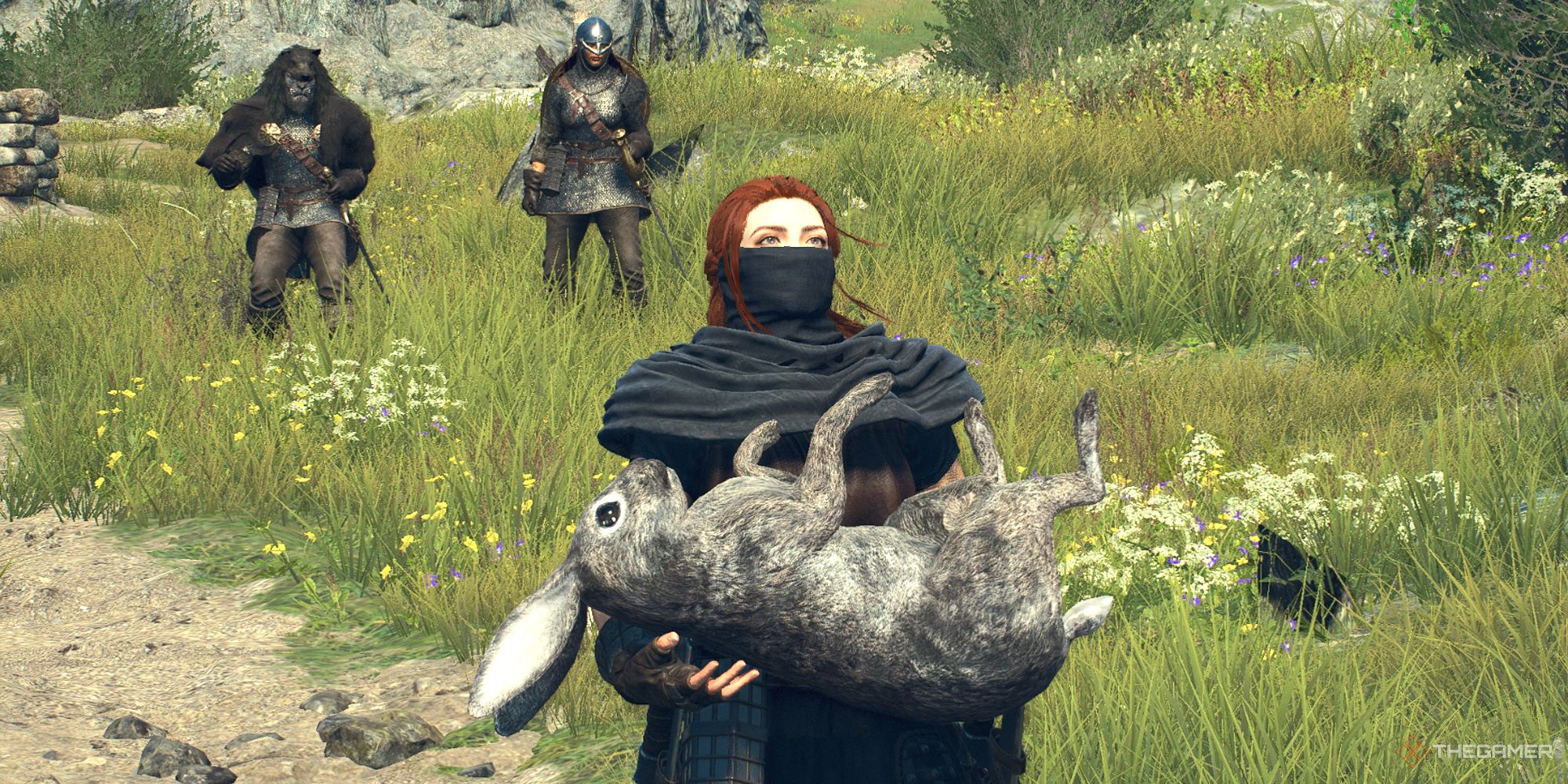 Dragon's Dogma 2 Arisen holding a rabbit with pawns in the background