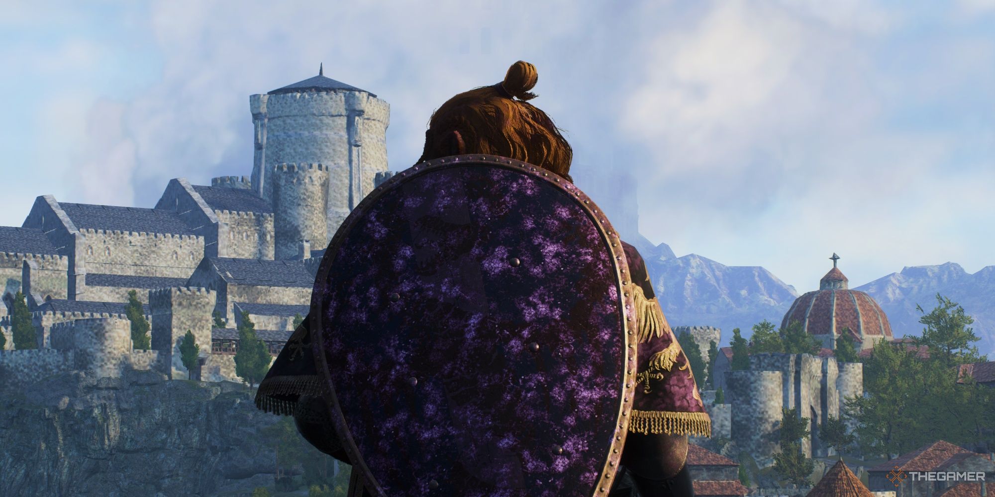The charachter standing in Dragon's Dogma 2 watching the castle from afar