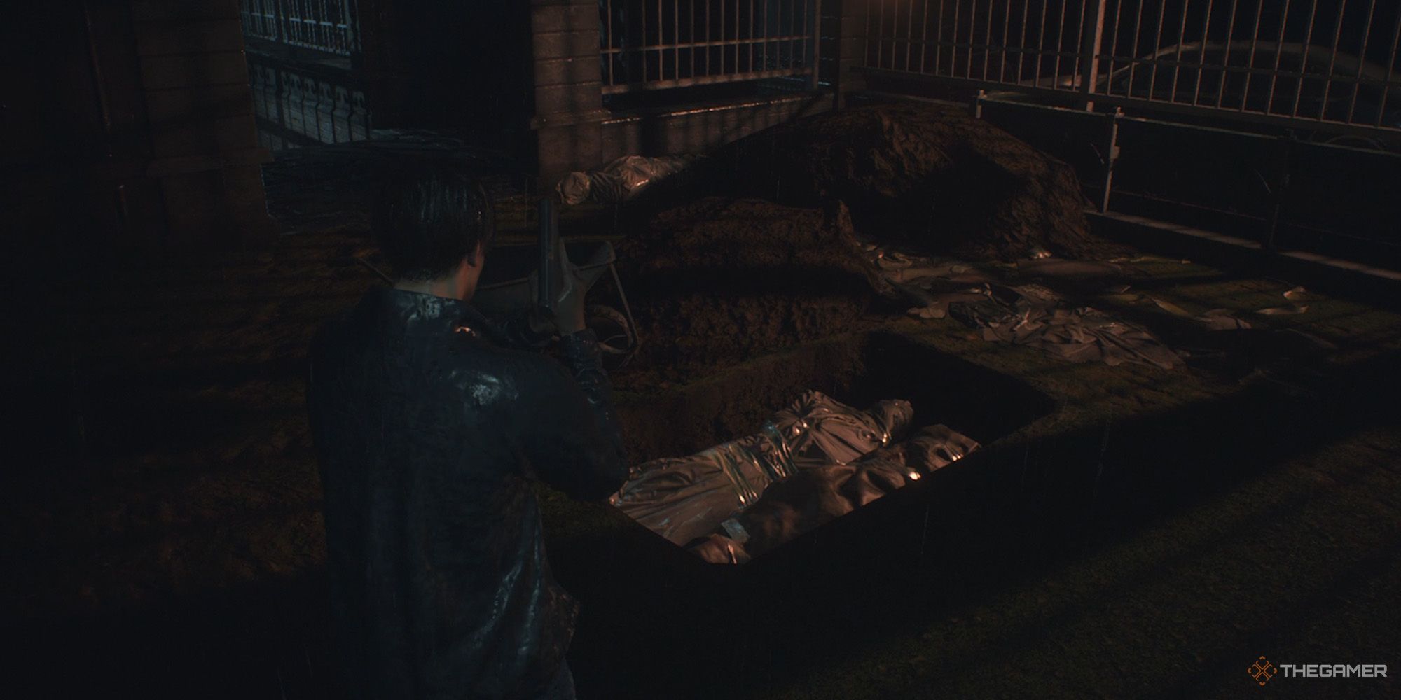 Leon looking down at a grave in Resident Evil 2 Remake