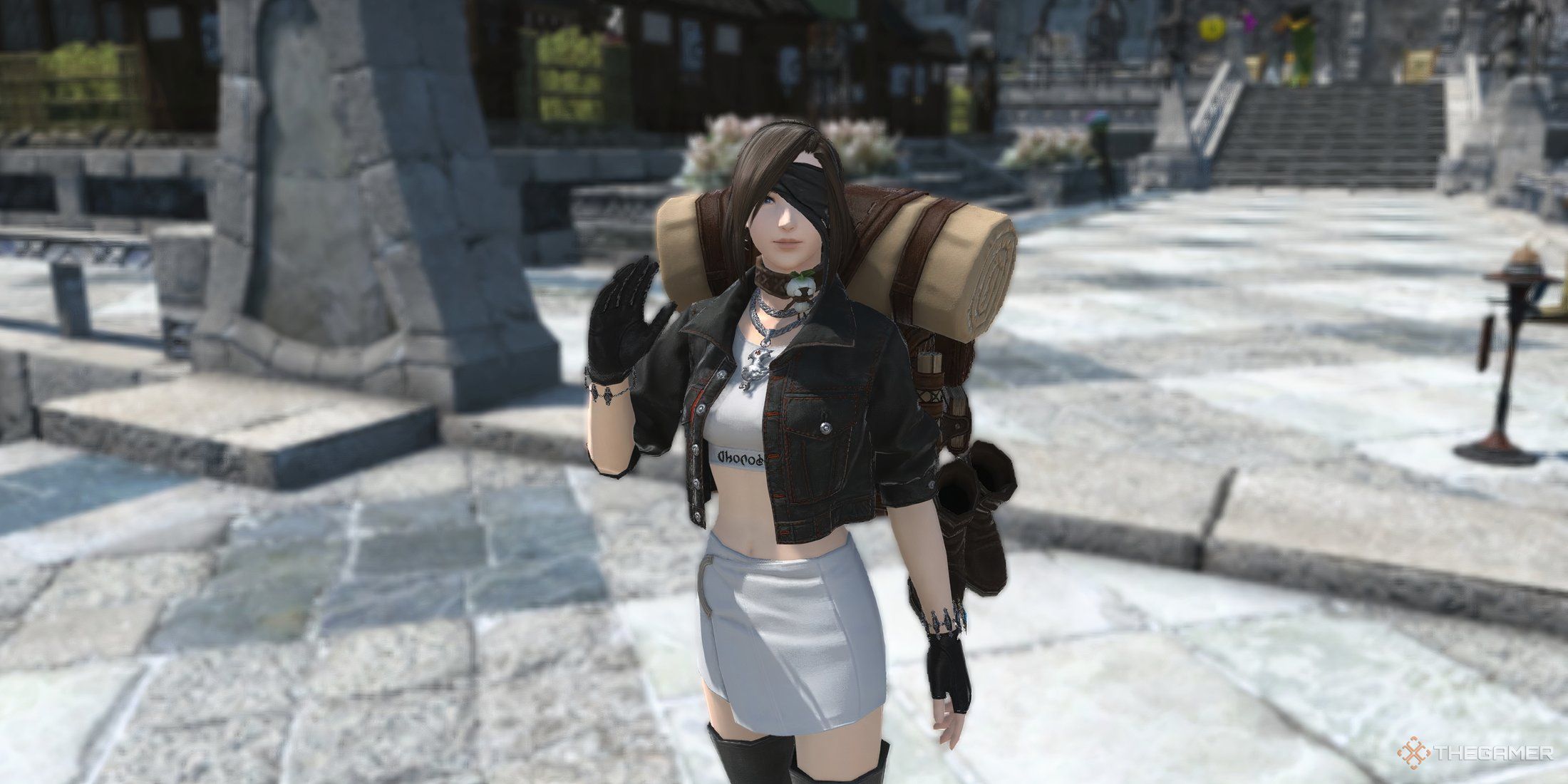 A player waving at the screen while using the knapsack accessory in Final Fantasy 14.