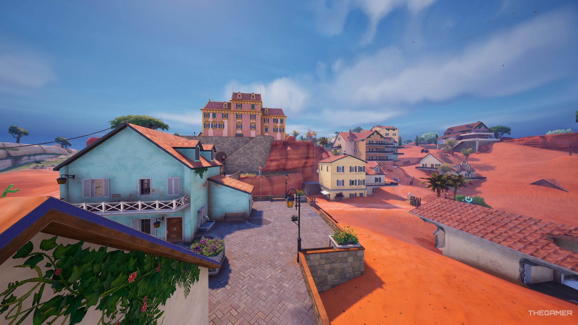 An image from Fortnite of the Sandy Steppes POI, which features many italian buildings covered in sand.