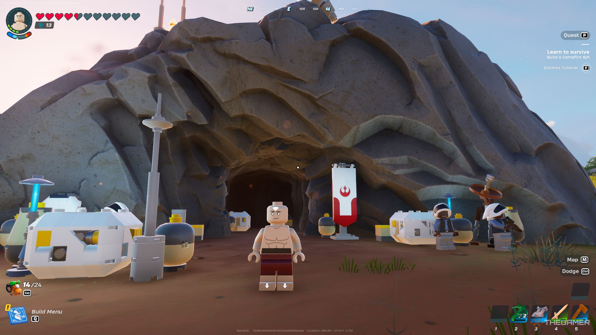 A screenshot from Lego Fortnite showing a player character as Avatar Aang standing outside of a cave with Rebels and the Rebel Alliance banners draped around it.