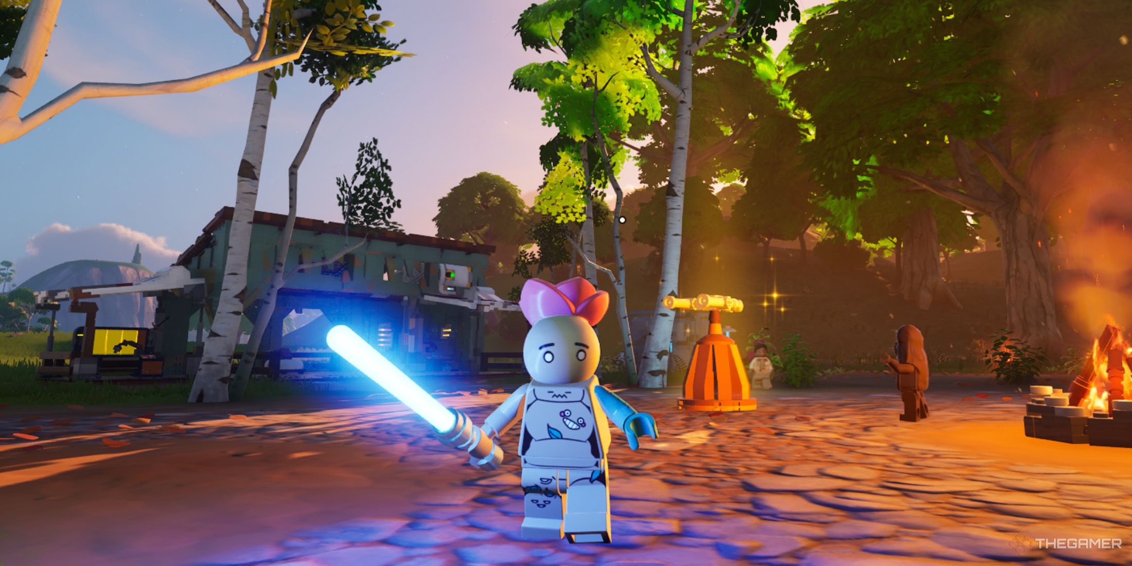 A screenshot from Lego Fortnite showing the player character as a Mochi Monster holding a blue lightsaber inside a rebel village.
