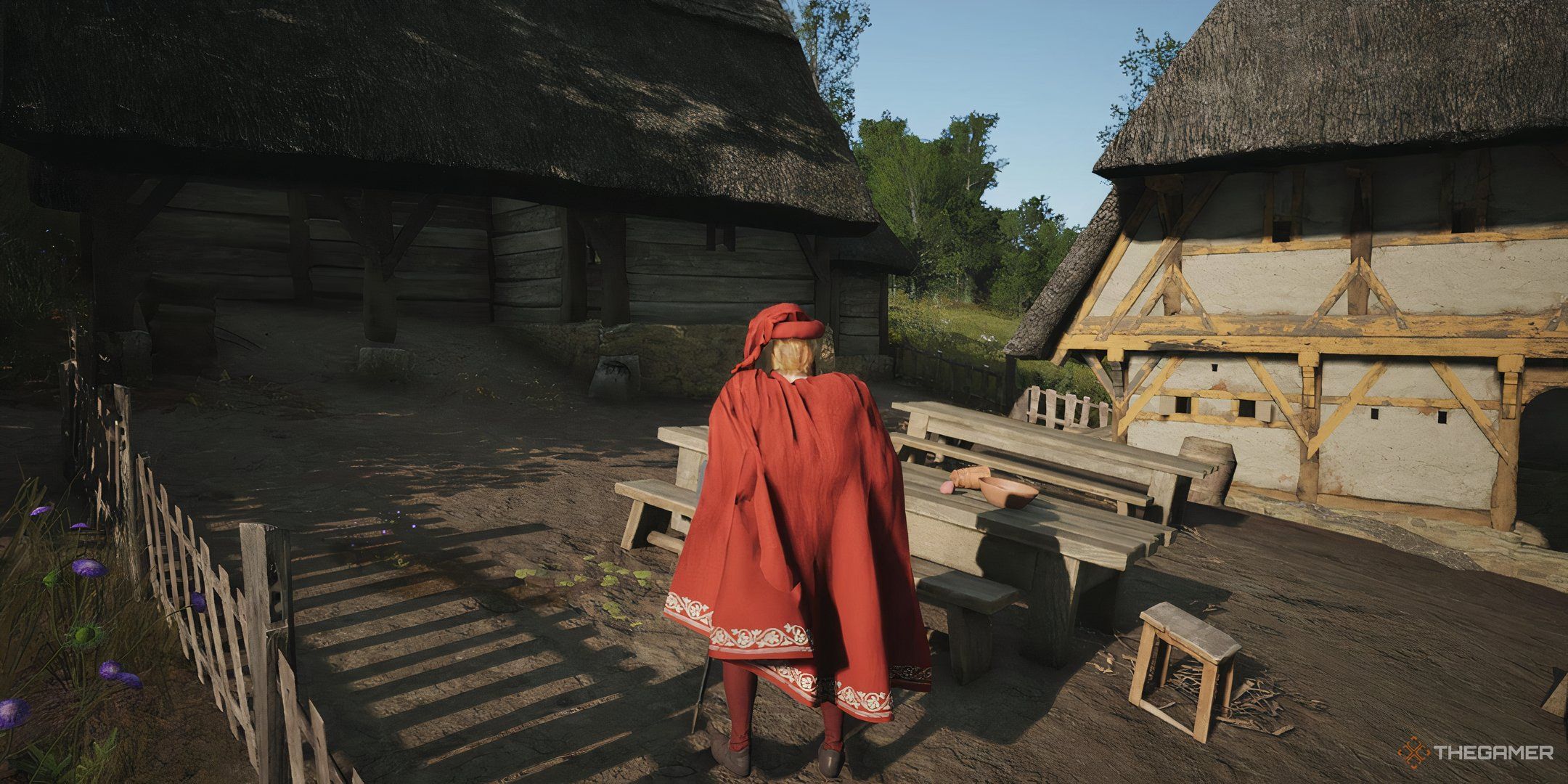 A lord standing inside a Tavern in Manor Lords.