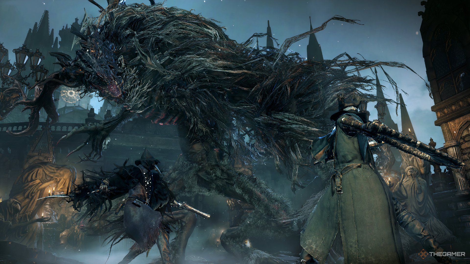 Characters battling a beast in Bloodborne.