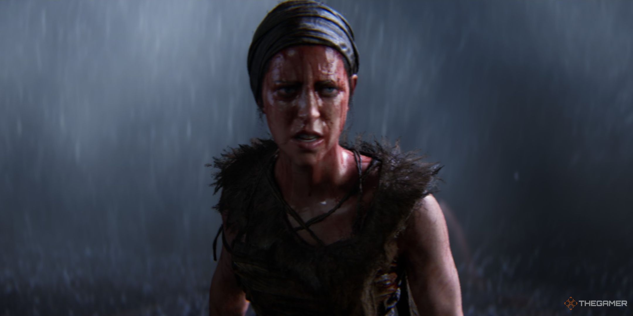 Senua catches her breath during a rainstorm in Senua's Saga: Hellblade 2.